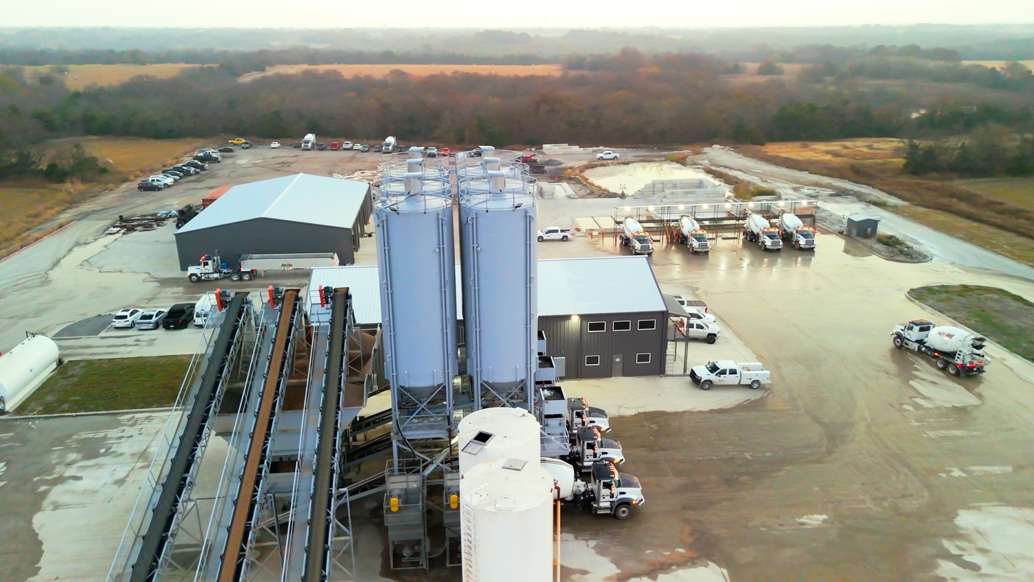 Aerial view of Wylie Texas concrete batching plant captured by Kin & Lens Creative Media construction photographer in Dallas Fort Worth