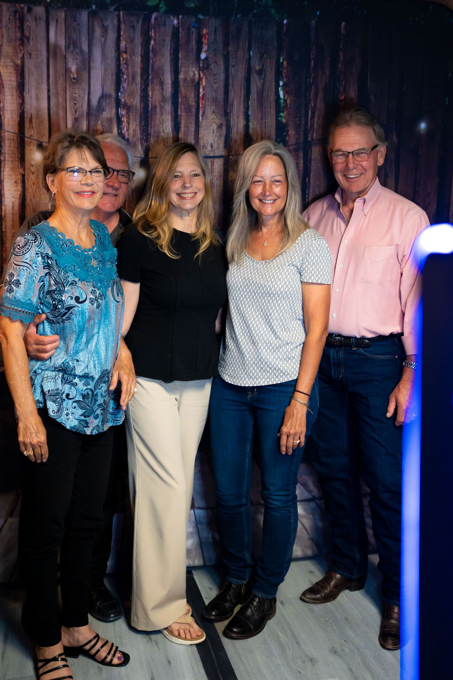 Group portrait during celebration captured at the DSLR photo booth by Kin & Lens Creative Media event photographer in Frisco Texas
