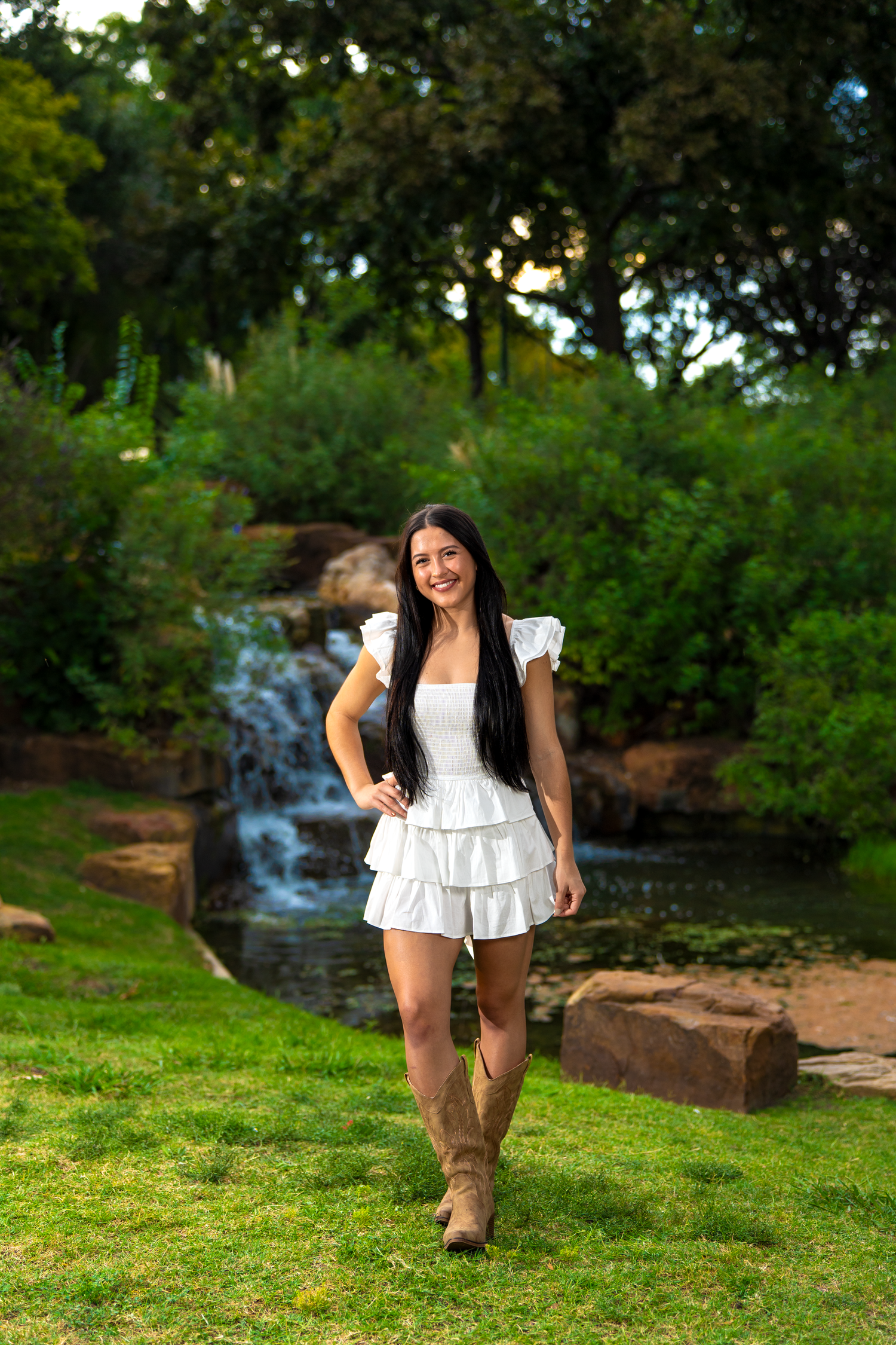 Vibrant senior portrait session in a Frisco, TX park by Kin & Lens Creative Media.