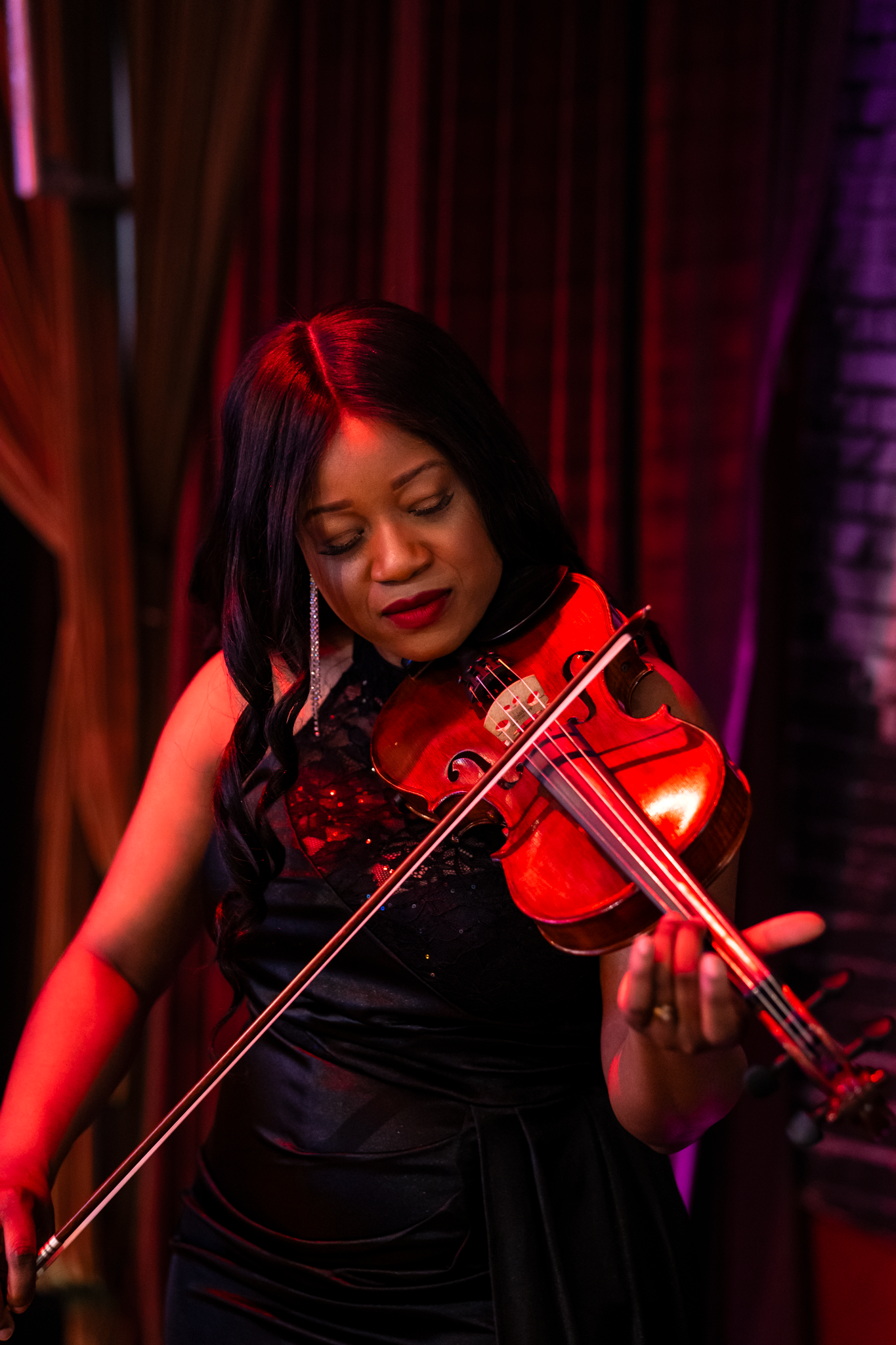 Violinist Music by Dalla performing live music at event captured by Kin & Lens Creative Media event photographer in Dallas Texas