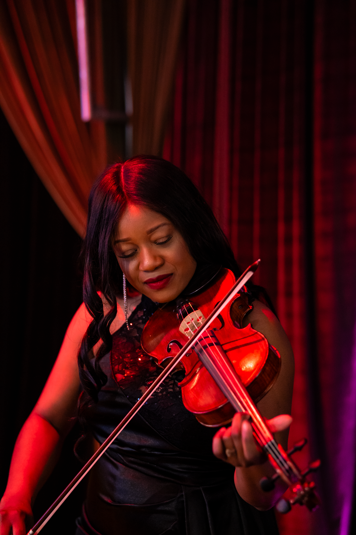 Violinist Music by Dalla performing live music at event captured by Kin & Lens Creative Media event photographer in Dallas Fort Worth