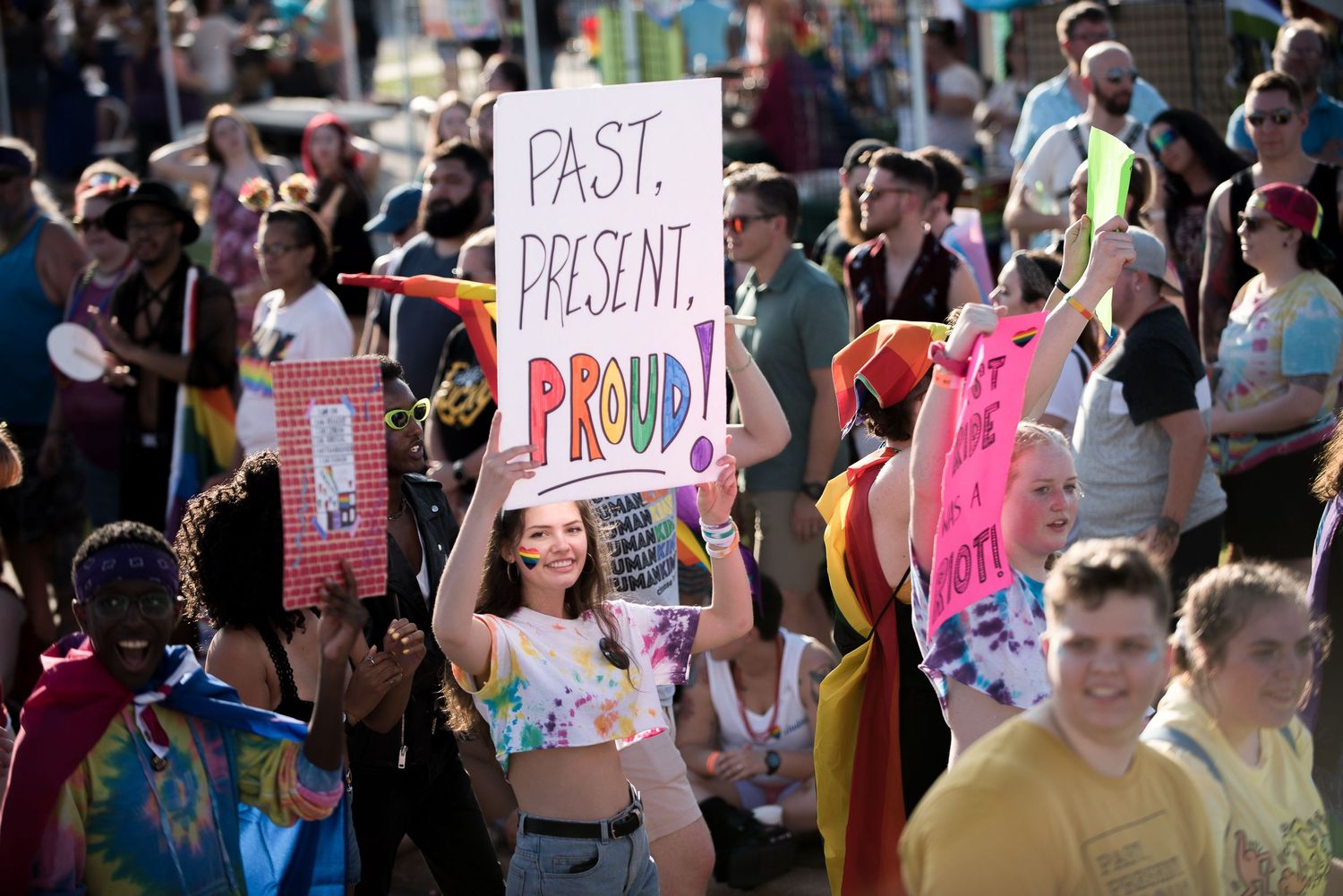Event. Woman with pride sign