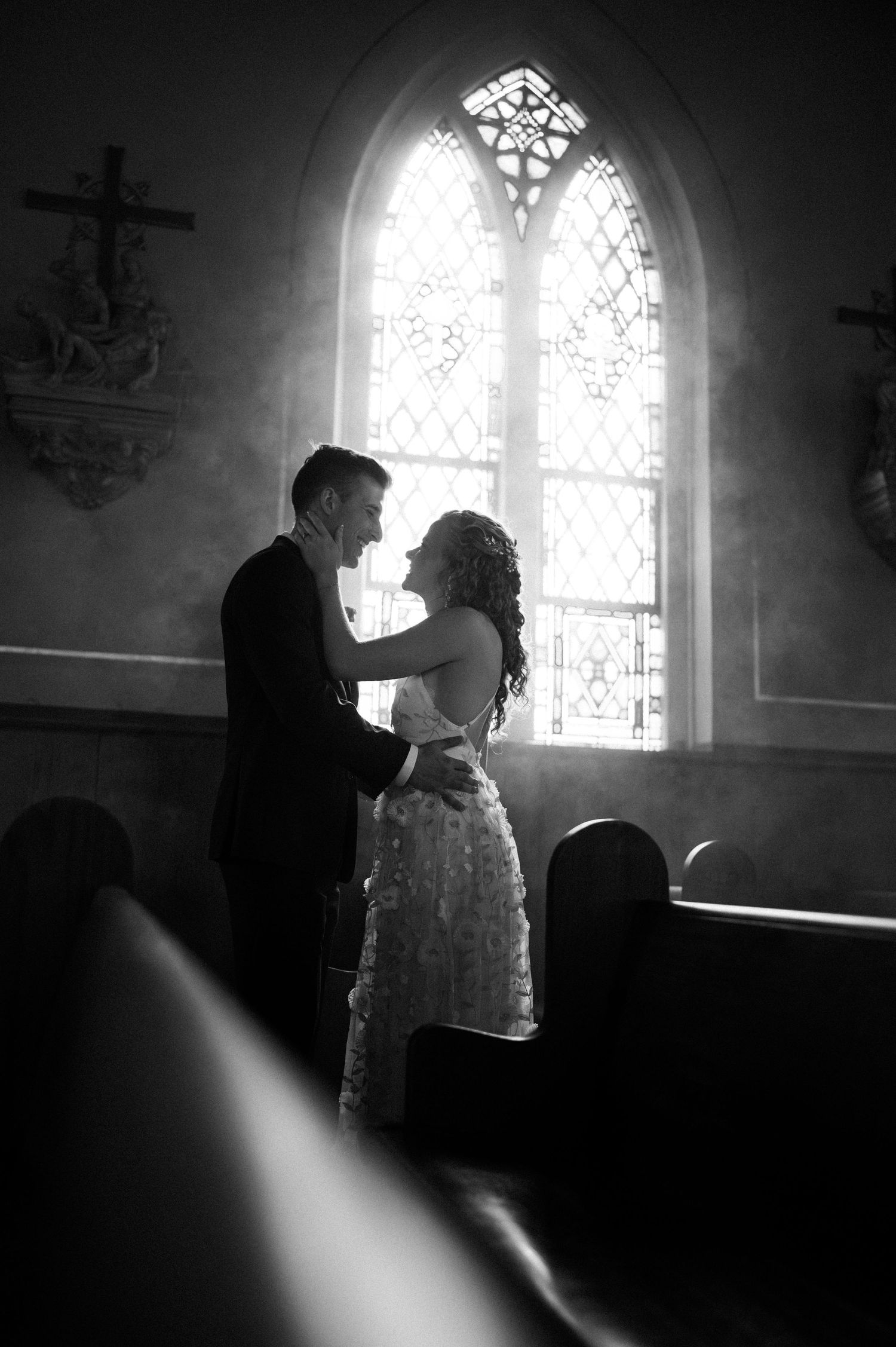Newlyweds smiling in church