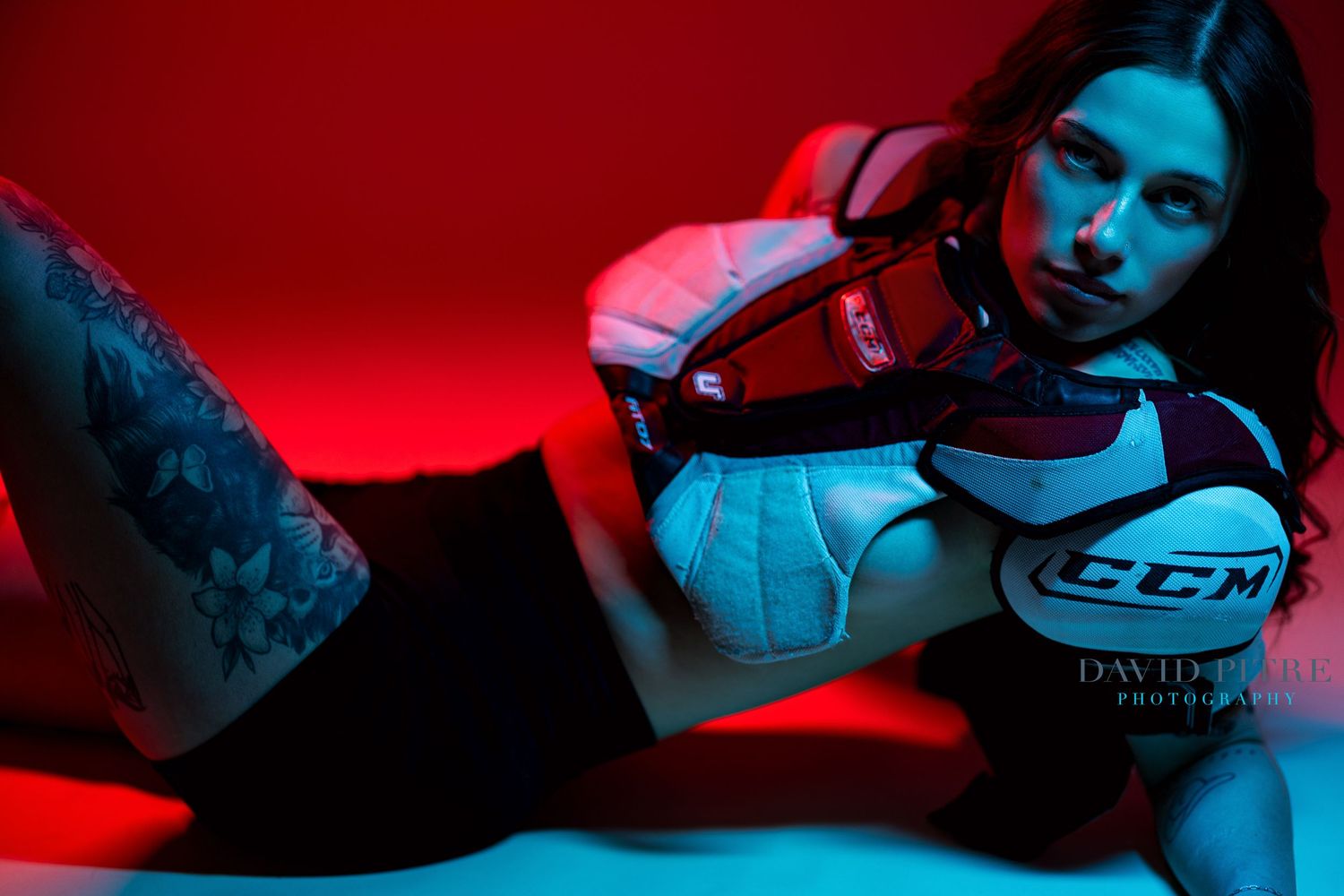 Artistic portrait sequence with bold red and cyan lighting effects.