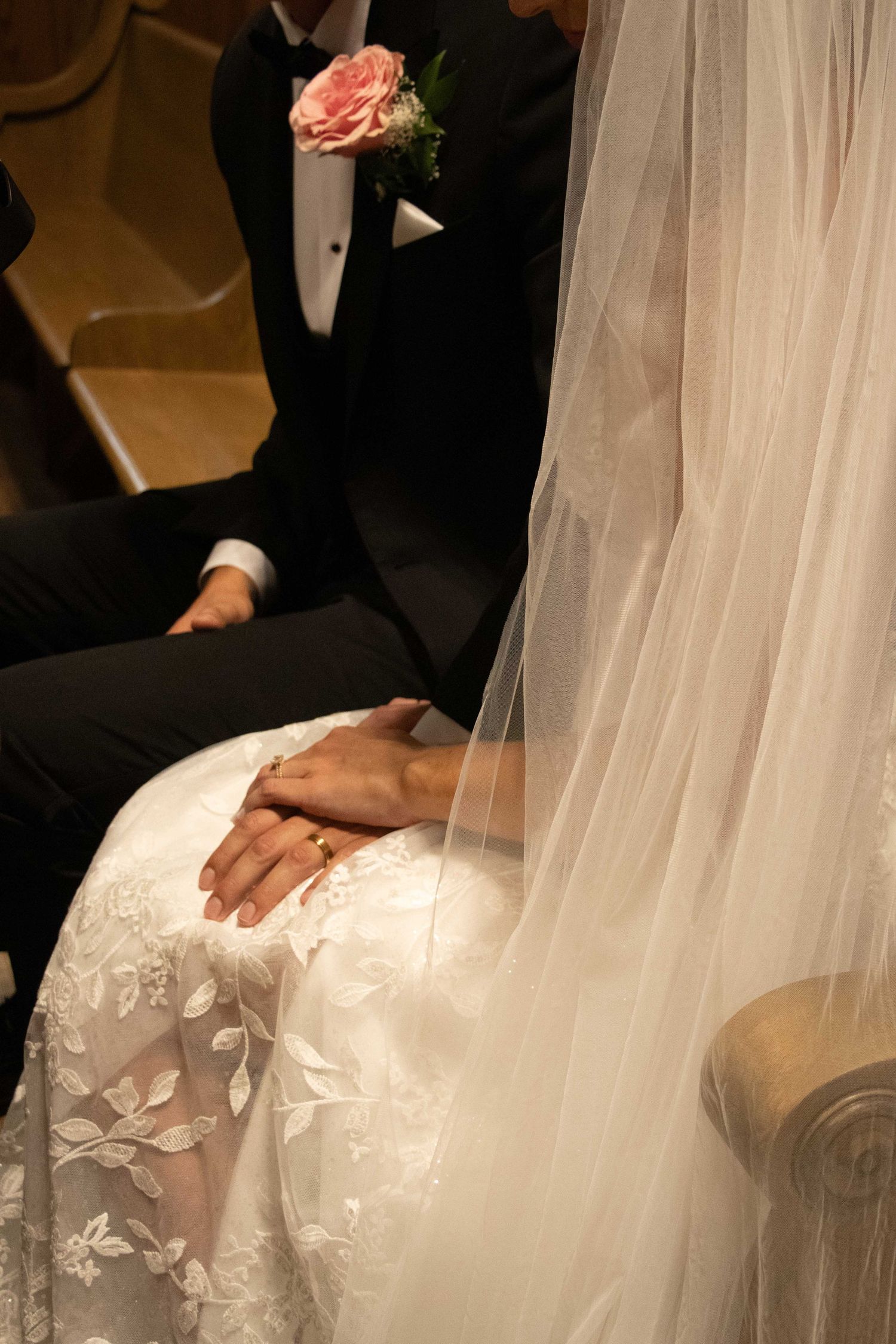 a bride and groom sit side by side in a Bend, Oregon church