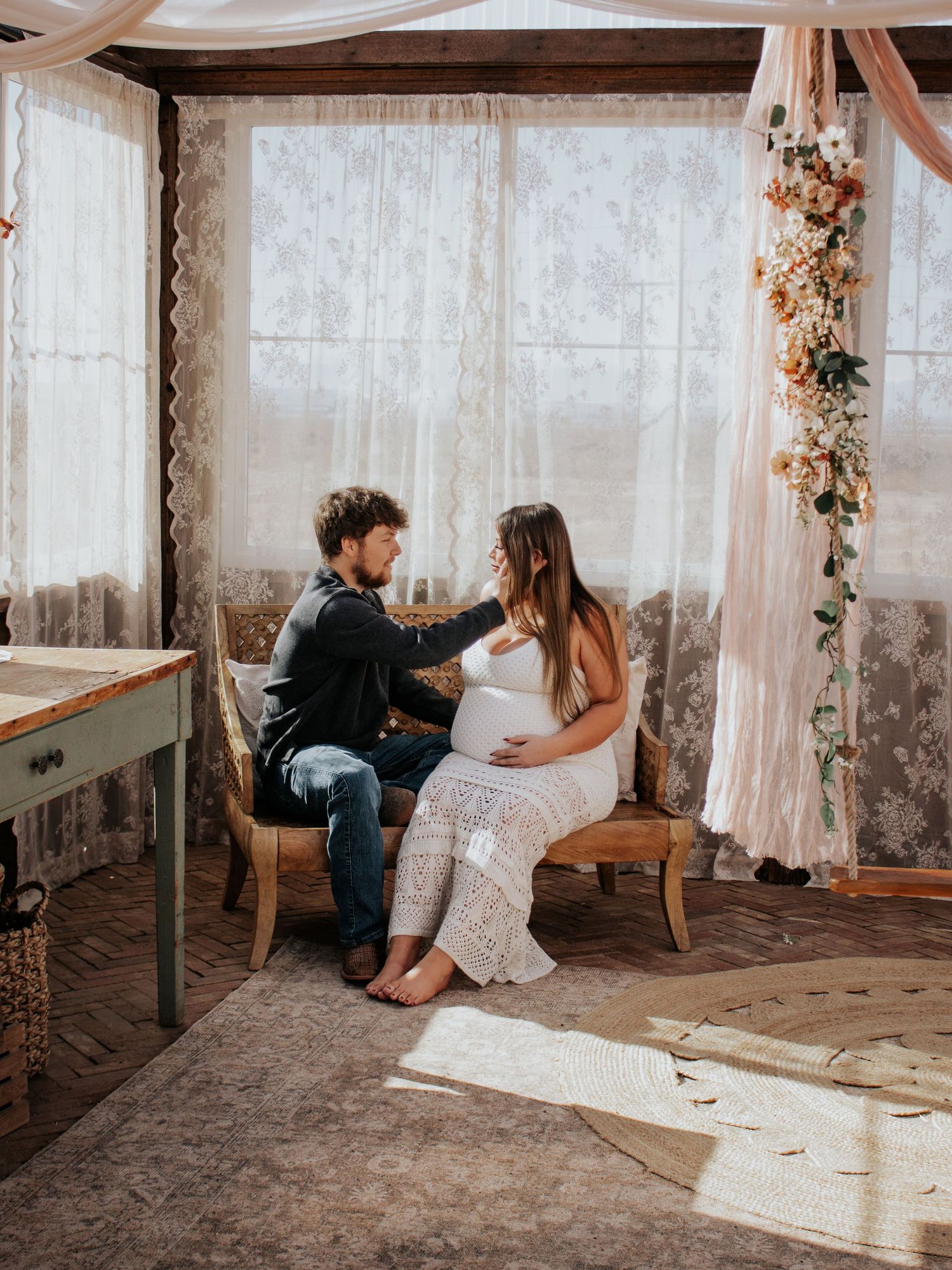 Soft natural light maternity couple