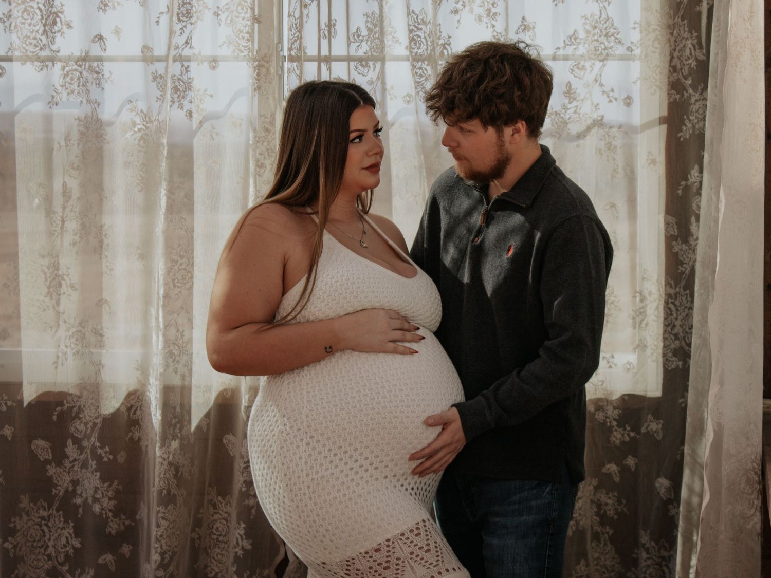 natural light intimate maternity couple