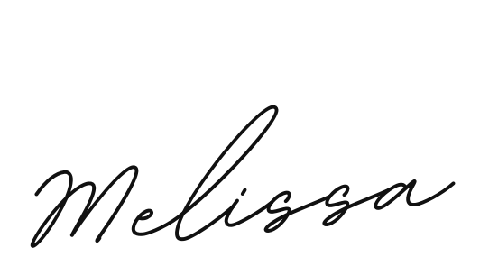 A handwritten signature in black ink appears on a white surface.