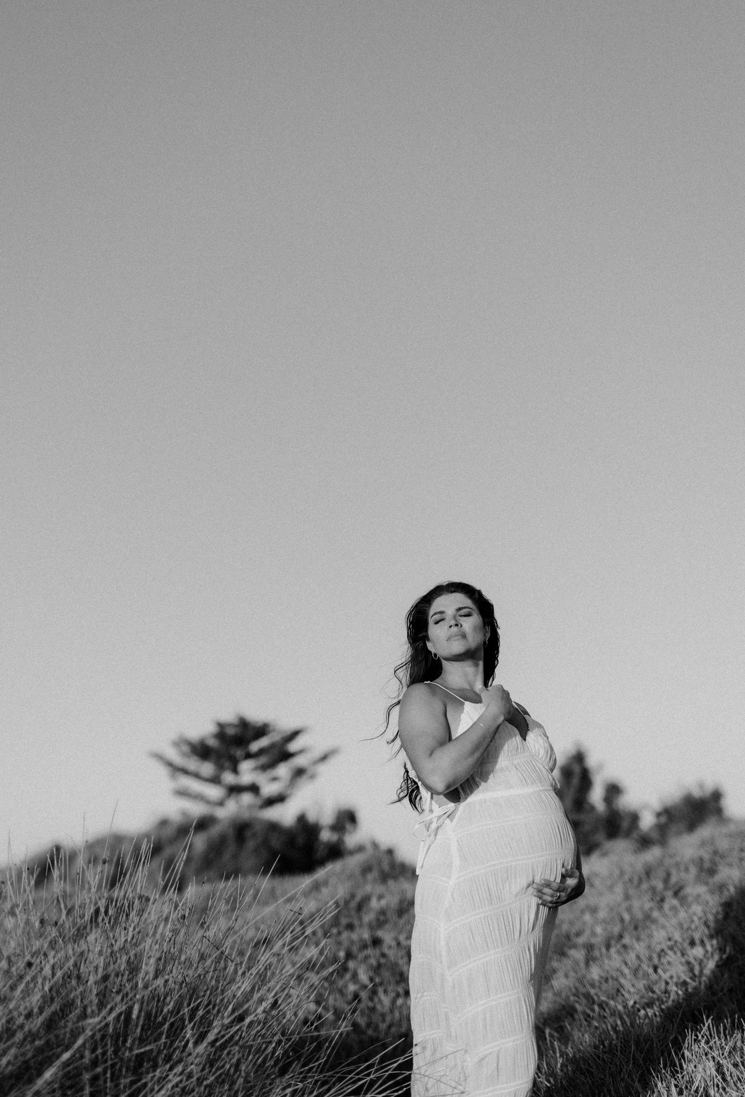 Pregnant mother during a beach sunset maternity session in Bunbury, Western Australia.