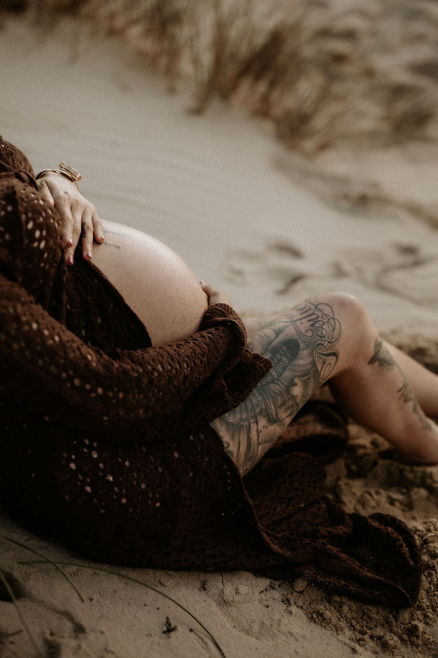Pregnant mother during a beach sunset maternity session in Bunbury, Western Australia.