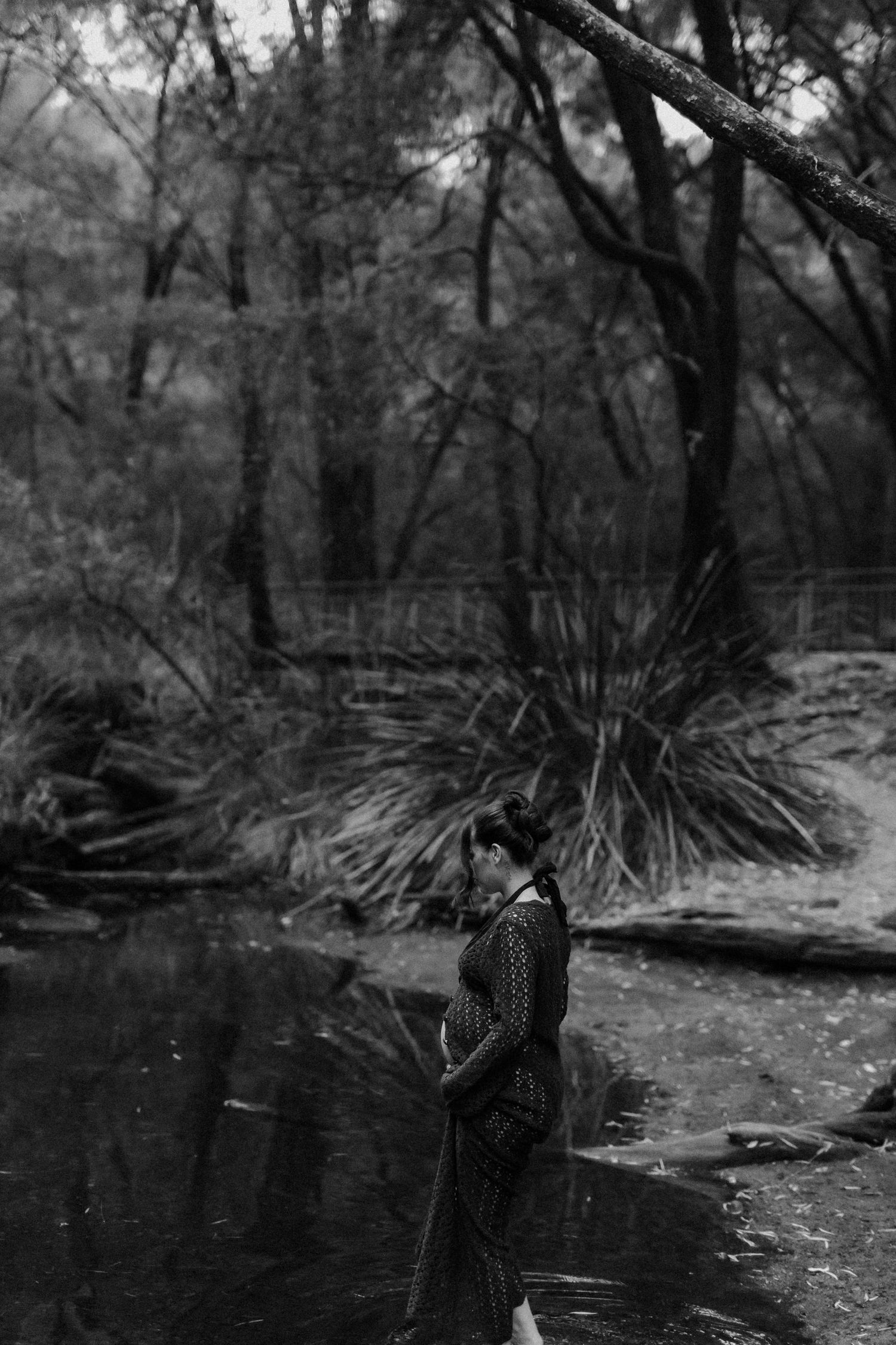 Pregnant mother during a sunset maternity session at Honeymoon Pool in Western Australia.