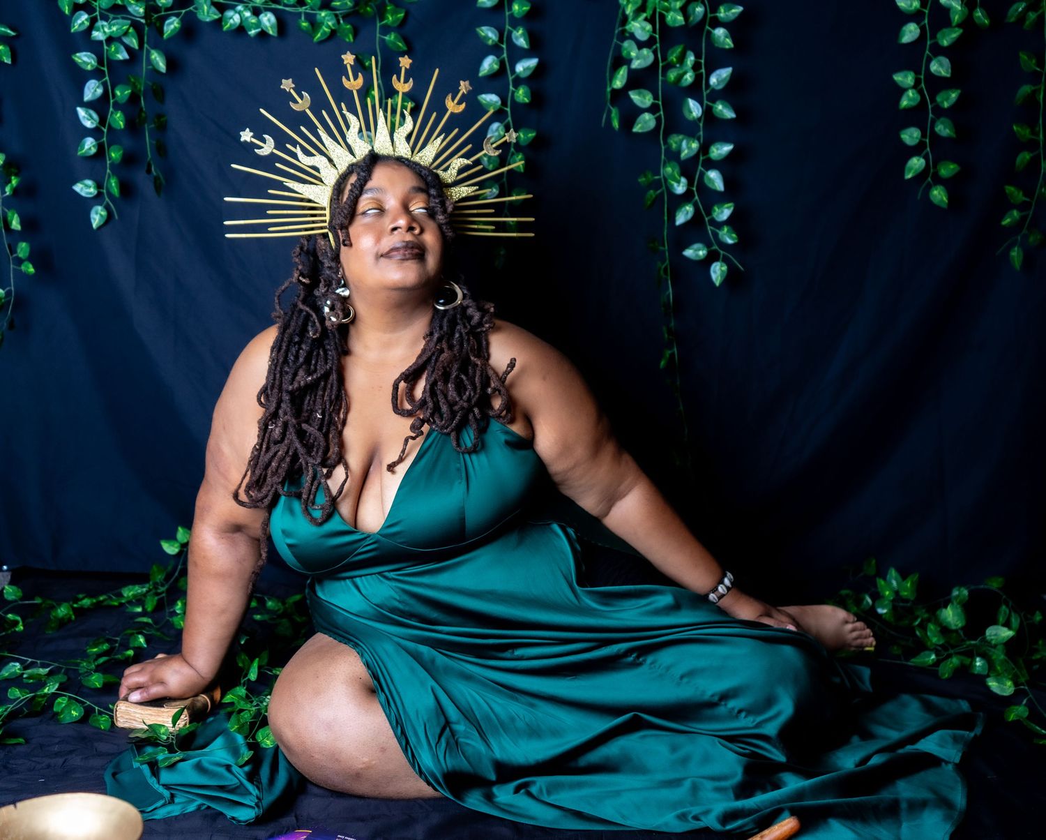 Goddess Energy Black Plus size woman in Green and a gold head piece. Very Earthy Intimate session by Hinton Imagery.