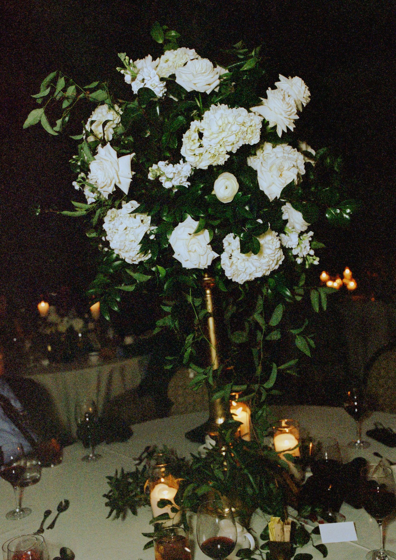 Elegant white floral centerpiece arrangement at wedding in Chicago, IL
