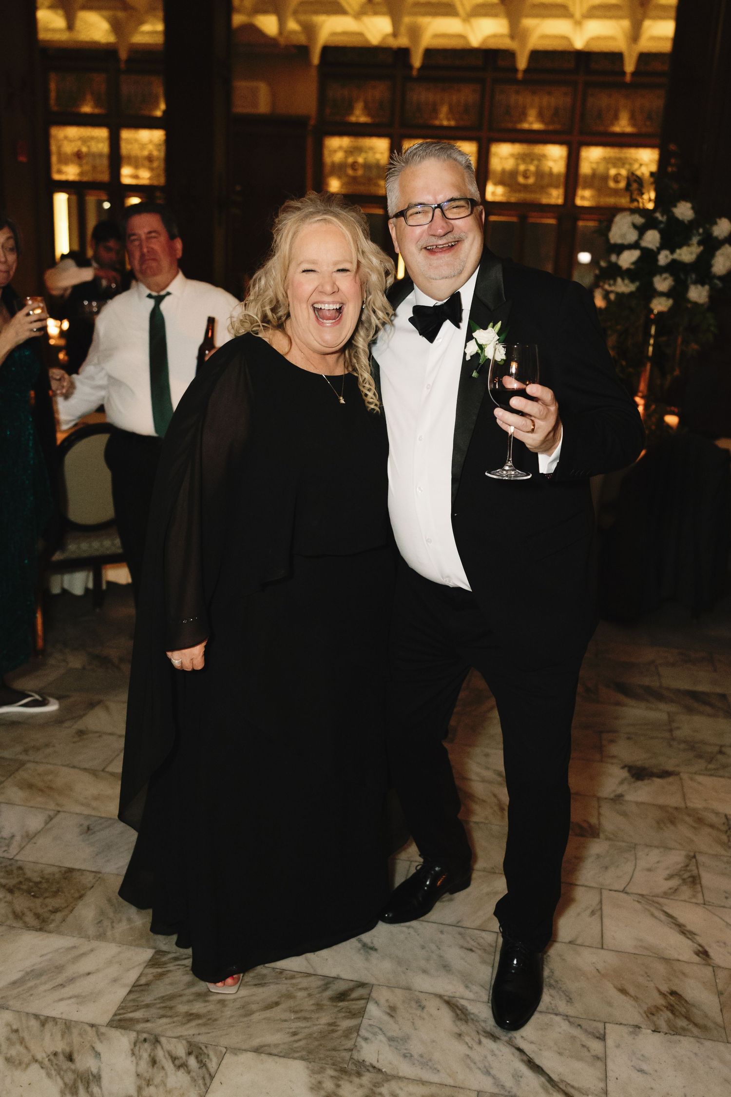 Parents of the groom enjoying reception at Chicago Athletic Association