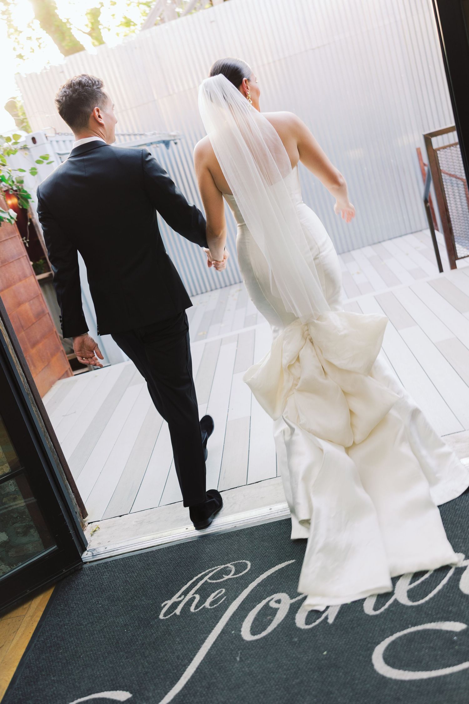Couple exiting their wedding ceremony at The Joinery Chicago