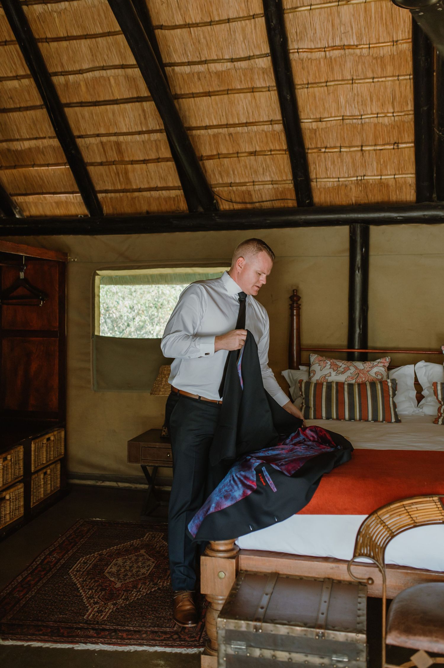 Series of photos showing someone getting ready in formal wear inside a rustic bedroom setting.