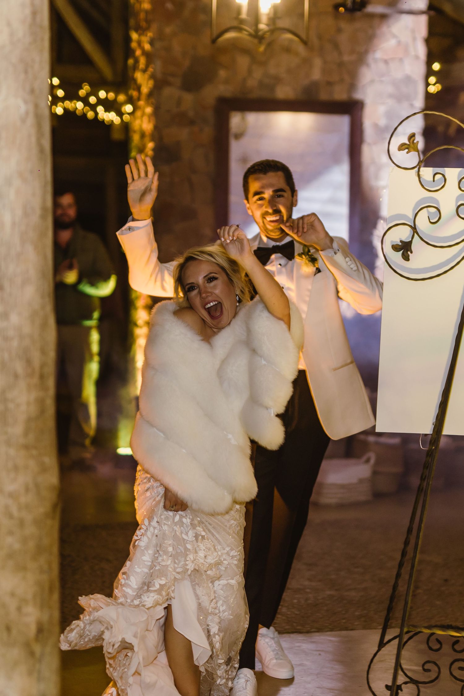 Wedding reception dance floor filled with celebration and joy.