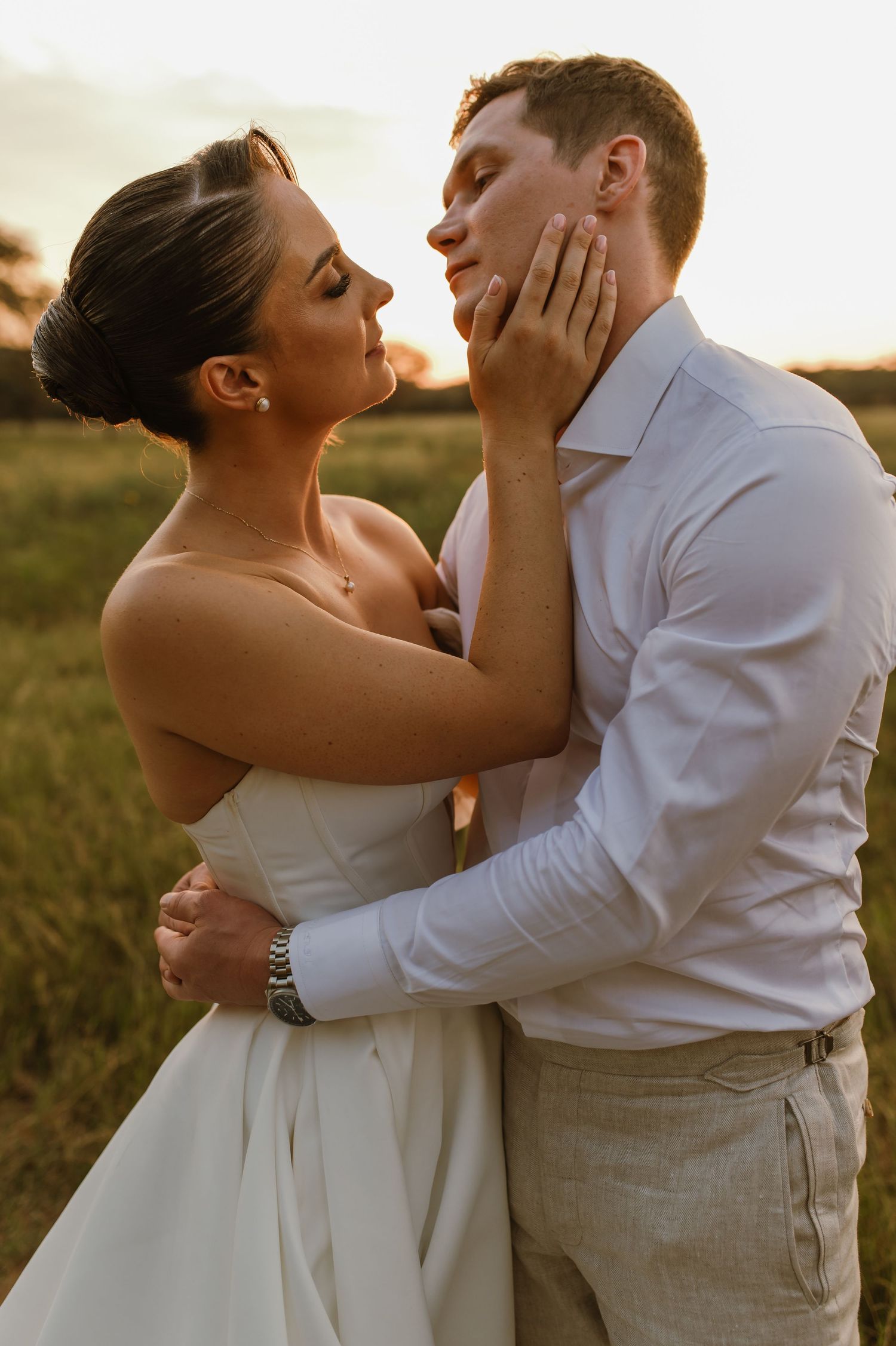 A tender embrace captured during a golden hour wedding photoshoot.