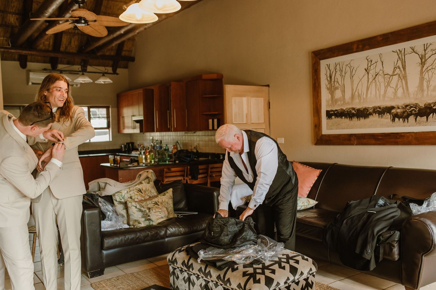 Elegant indoor venue with wooden beams and sophisticated lighting fixtures.