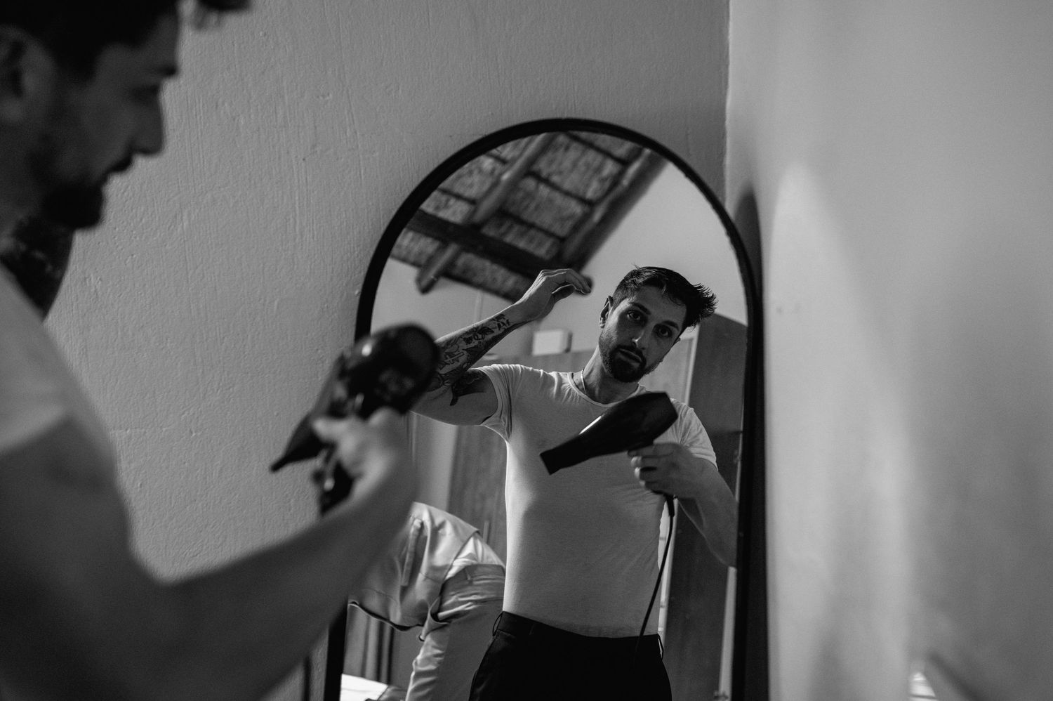 Black and white artistic shots of preparations in an indoor setting.
