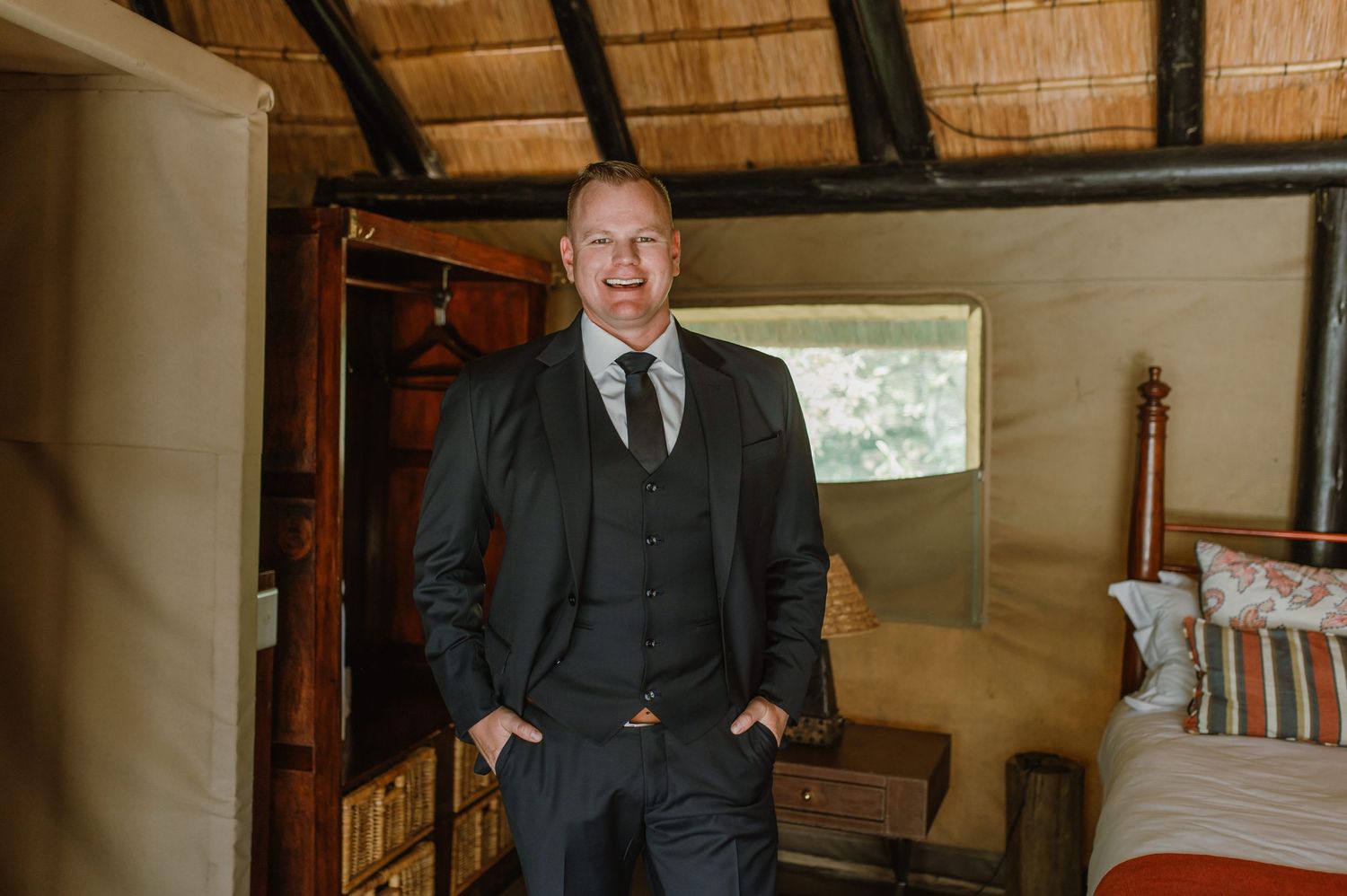 Multiple angles of someone in formal attire inside a rustic bedroom with traditional decor.