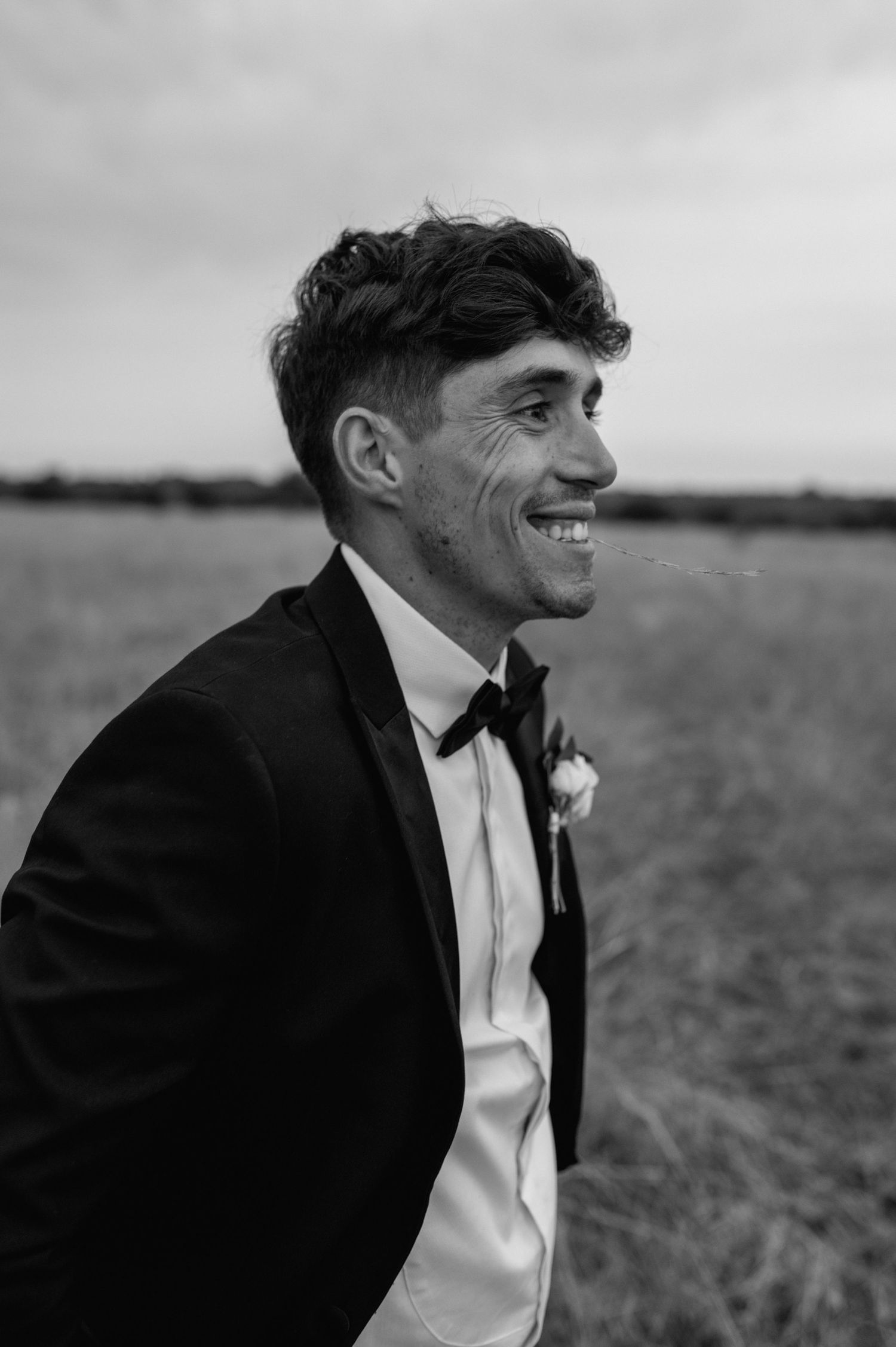 Black and white portraits showing joyful expressions in a natural outdoor setting.
