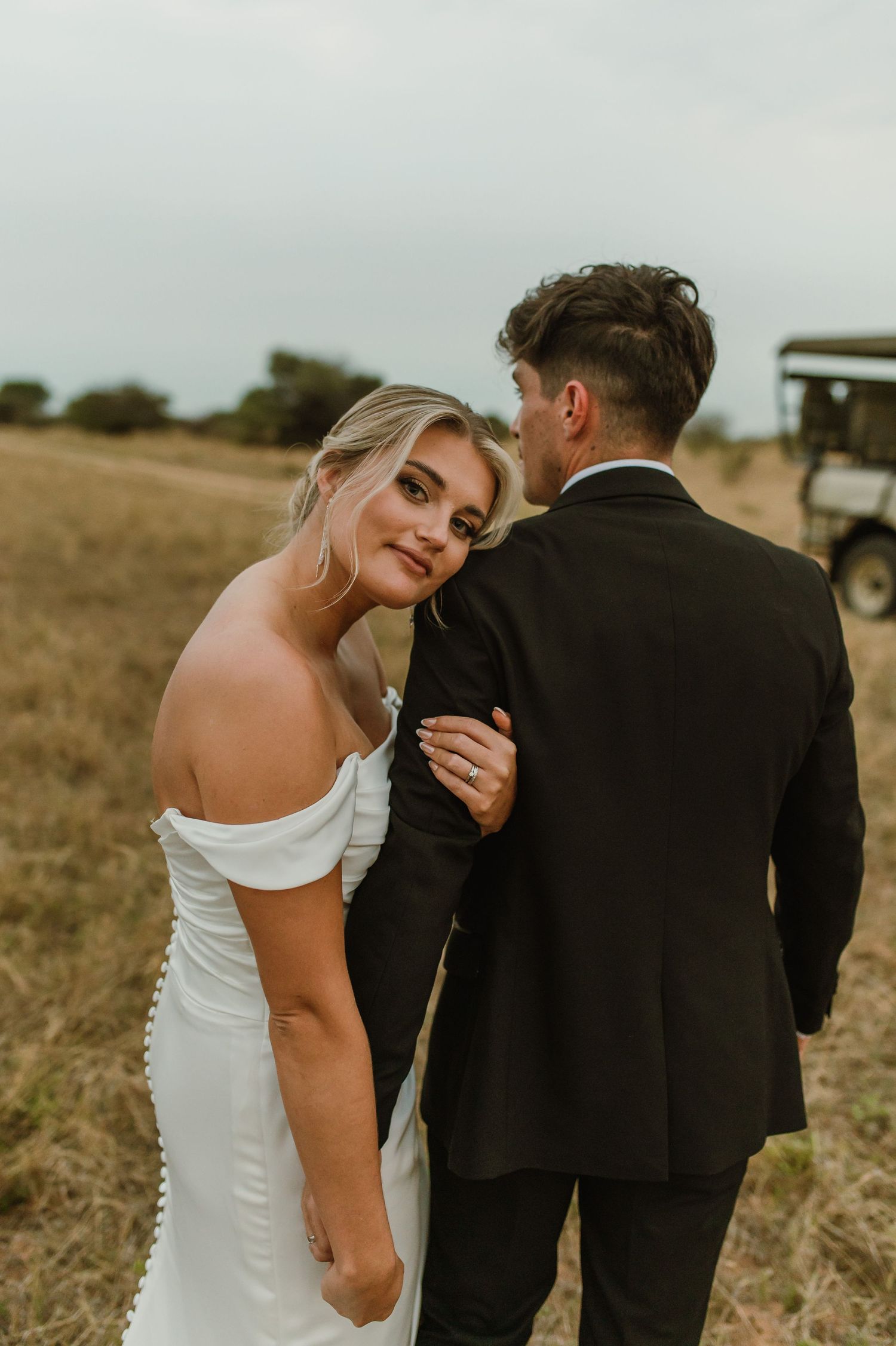 Romantic outdoor wedding photography sequence showing tender moments between newlyweds.