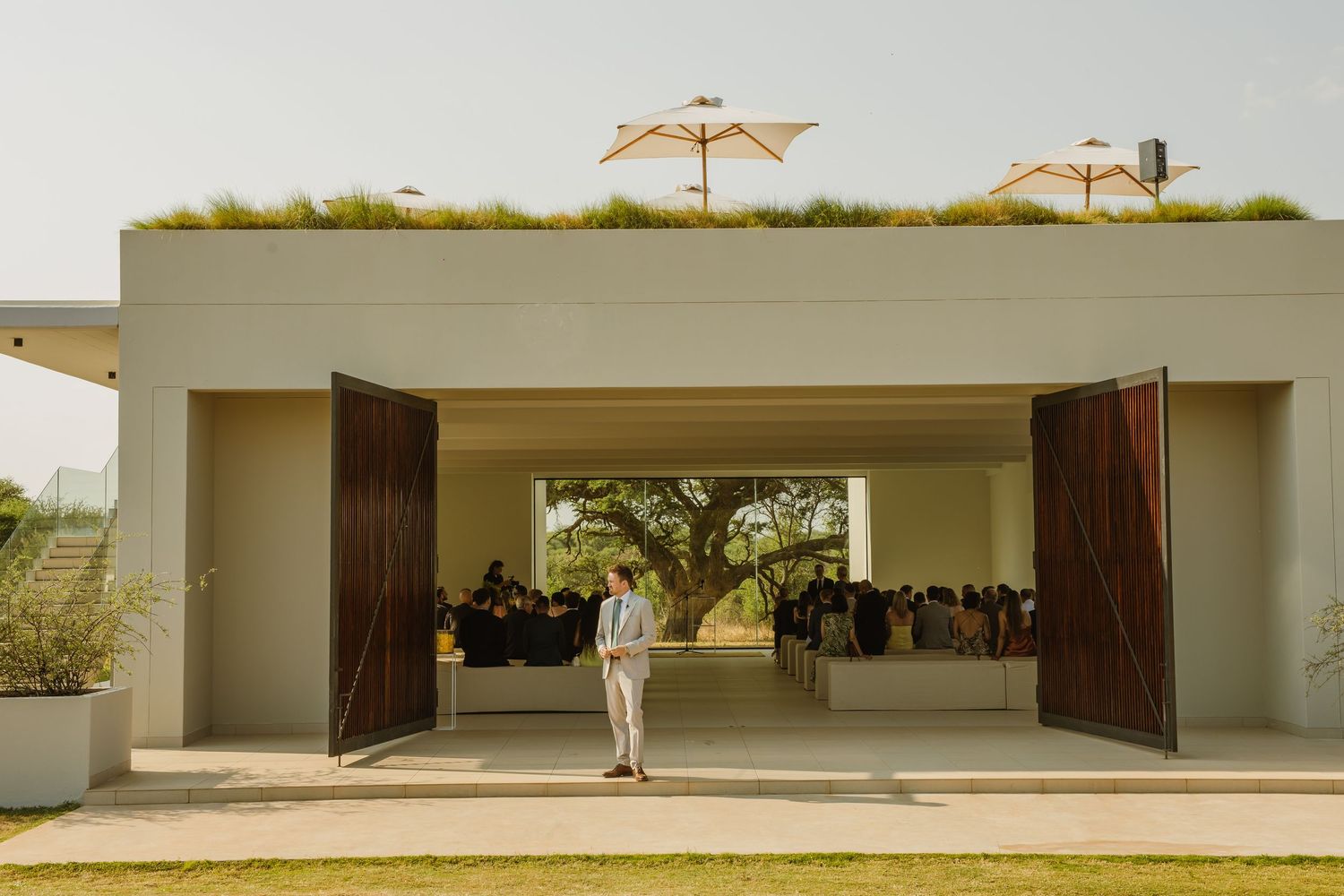 Modern white architectural structure with clean lines and minimal design.