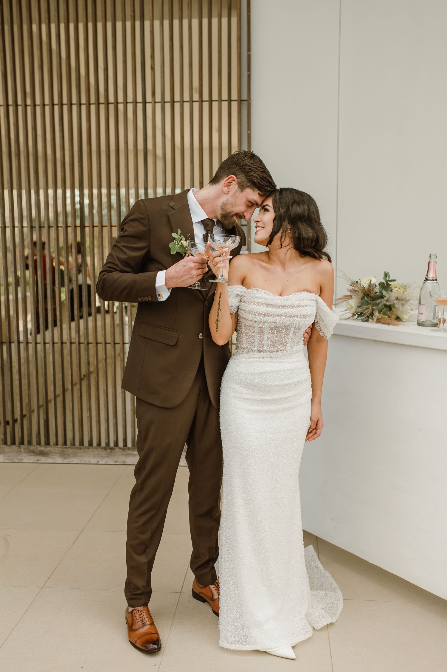 Wedding reception sequence showing champagne tower pouring celebration.