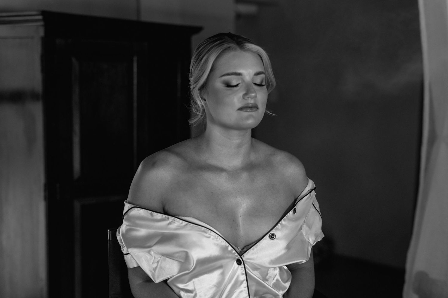 Black and white portrait series capturing candid moments and emotions.