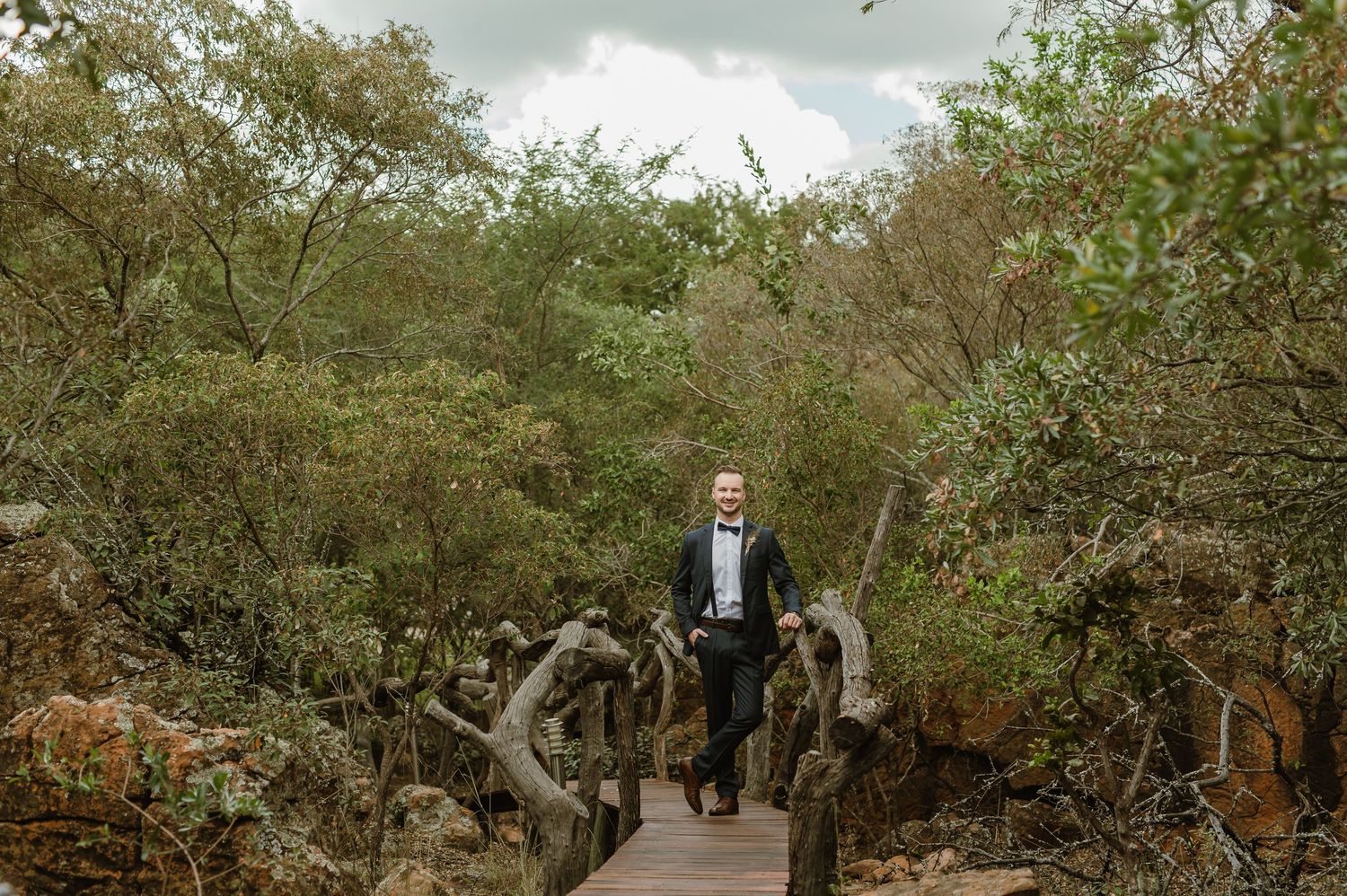 A winding pathway through a natural wooded area.