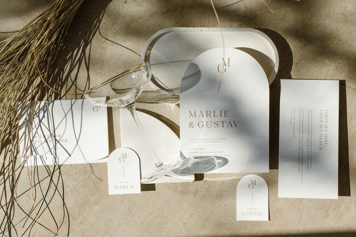 Modern minimalist wedding decor with delicate paper elements and natural textures.