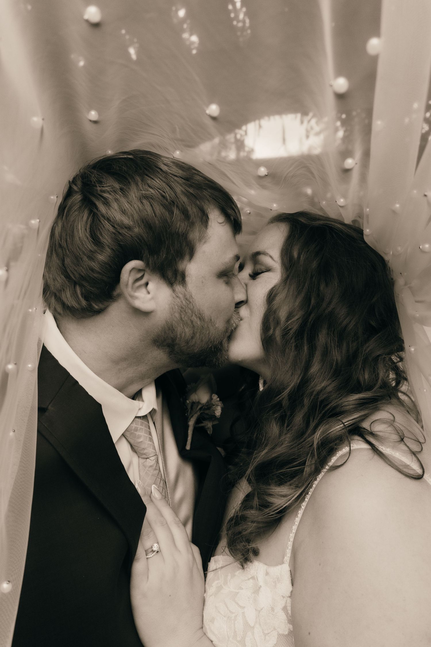A series of tender black and white wedding portraits capturing intimate moments.