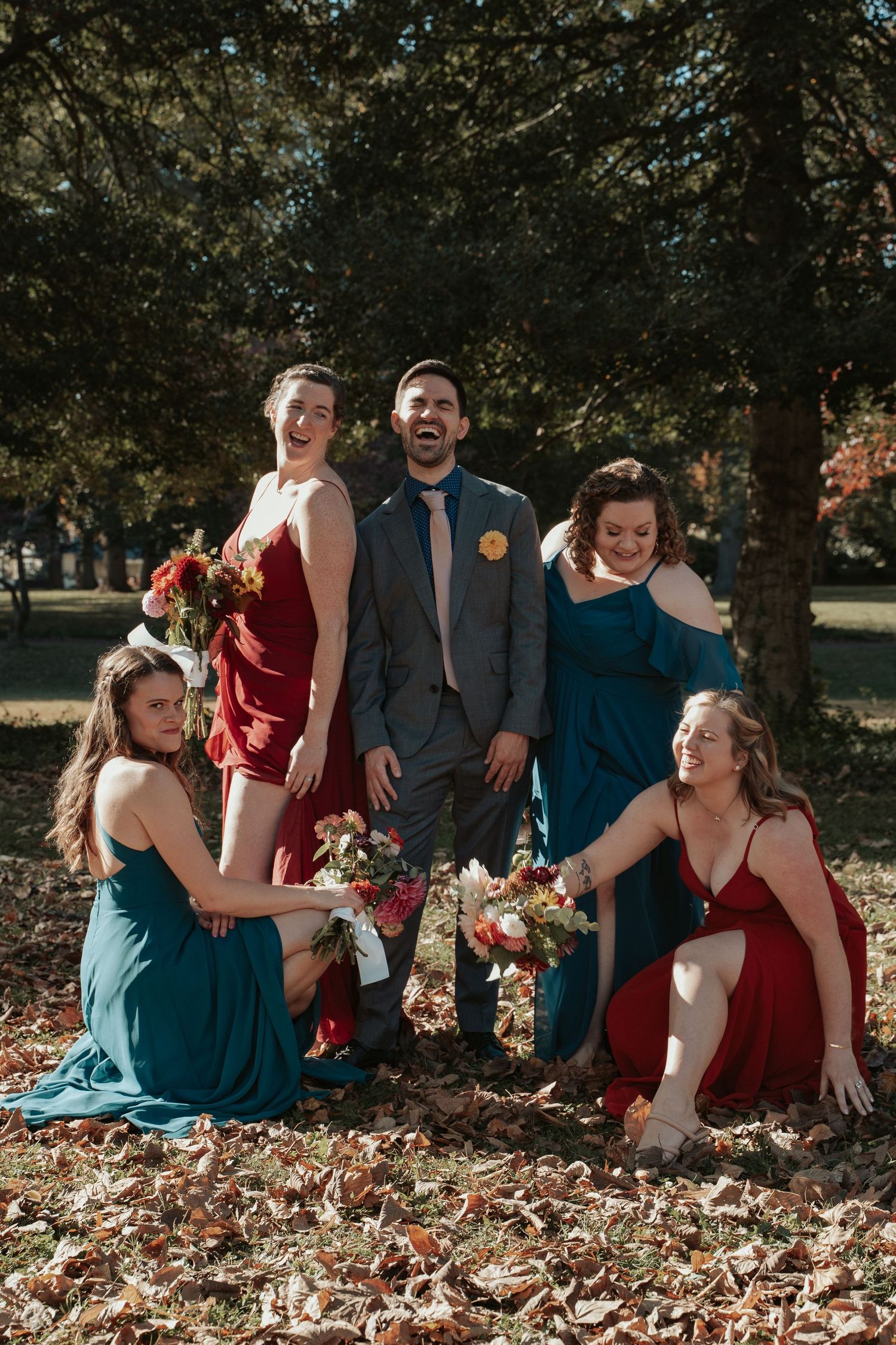 A gay groom is flanked by his wedding party before his ceremony at Byrd Park in Richmond Virginia
