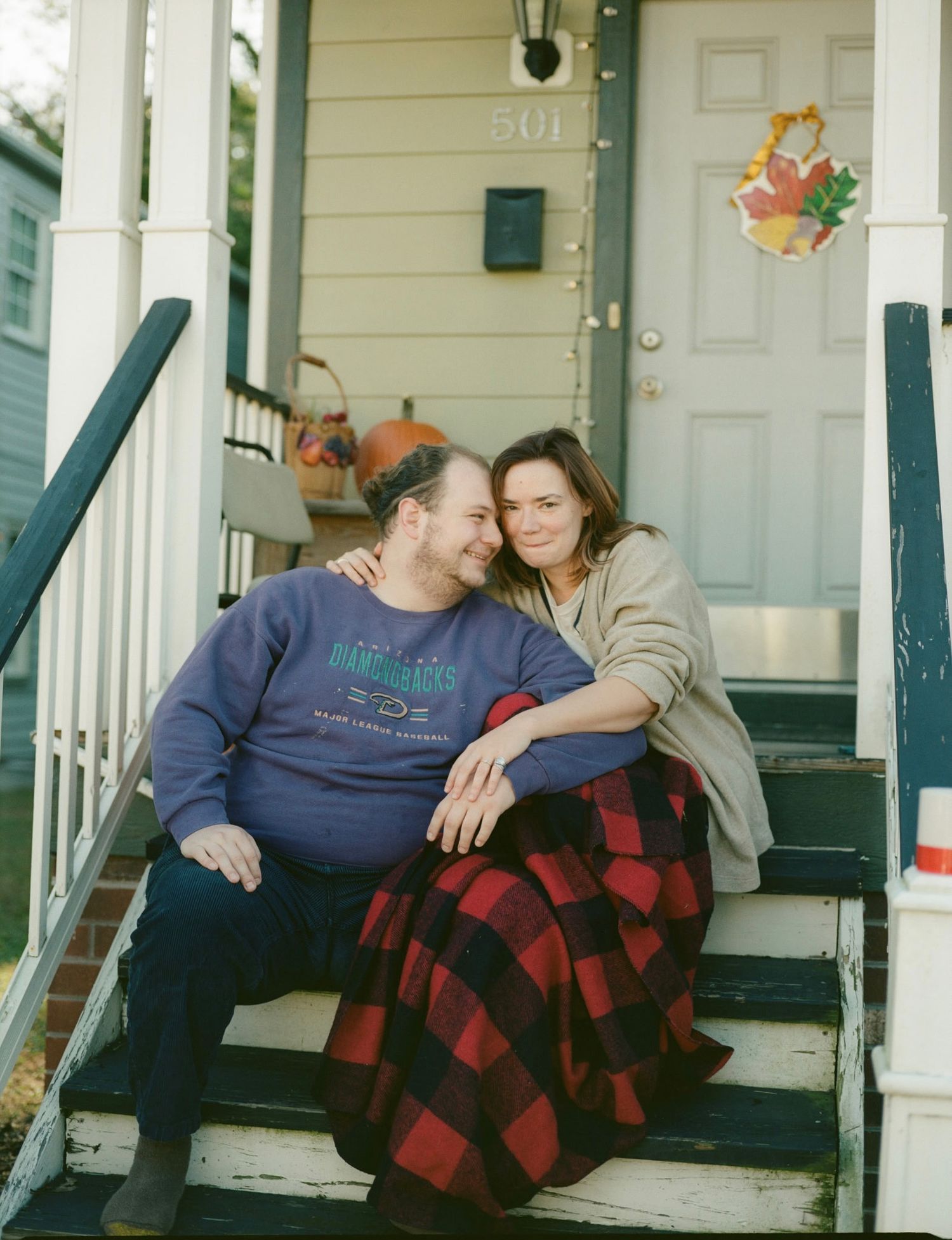 Queer photographer Daniel Bowler based in Maine in his engagement photos with non-binary partner