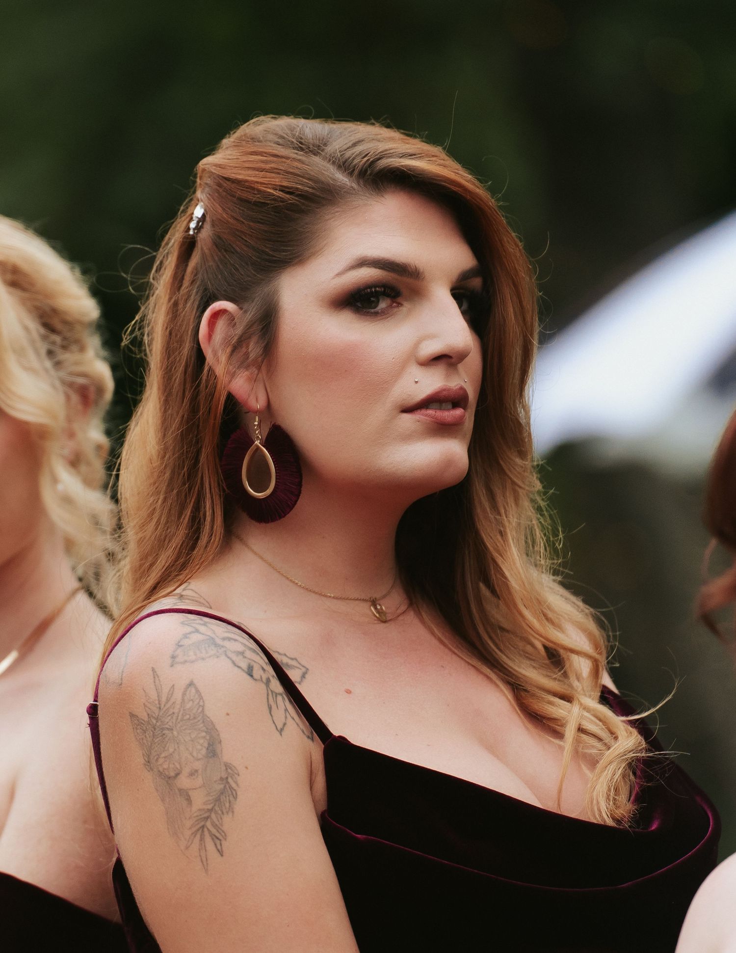 Richmond Virginia bridesmaid stuns in fine art portrait of red outfit and hair at the Mankin Mansion wedding venue