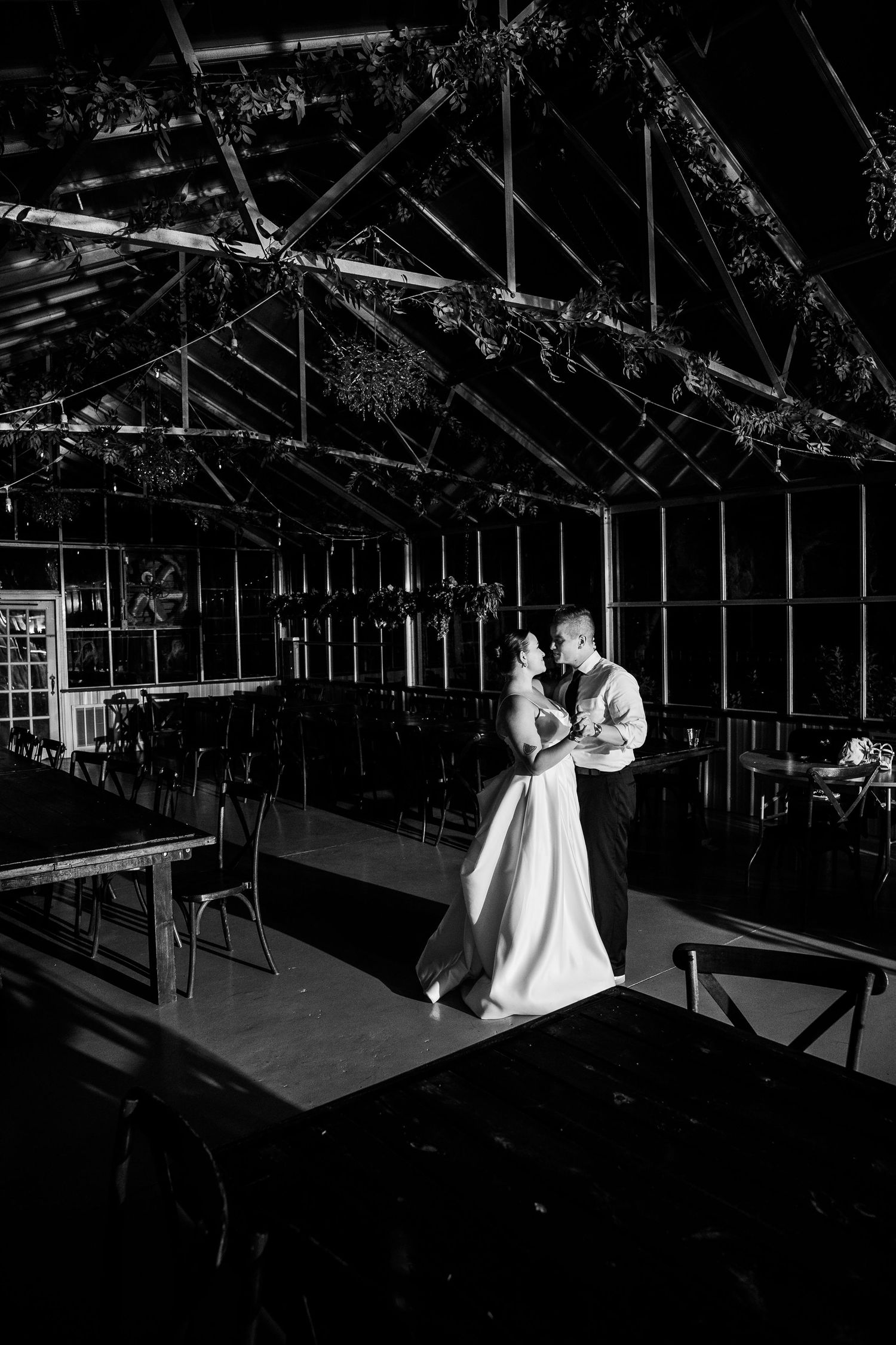 Bride and groom sway in editorial style black and white photo by Dan Bowler at Avonlea Farms outside of Richmond Virginia