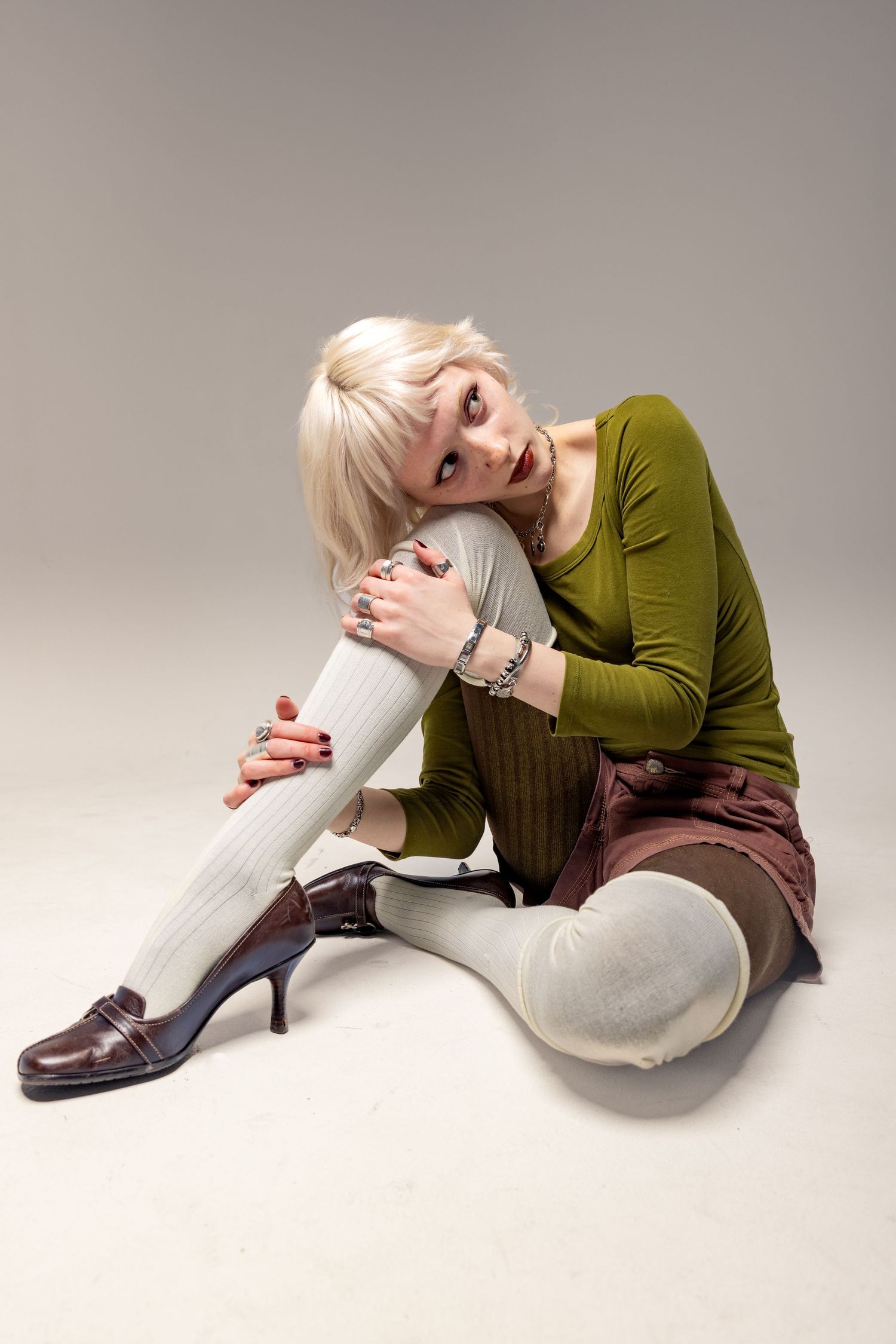 Model portfolio shoot with soft studio lighting.