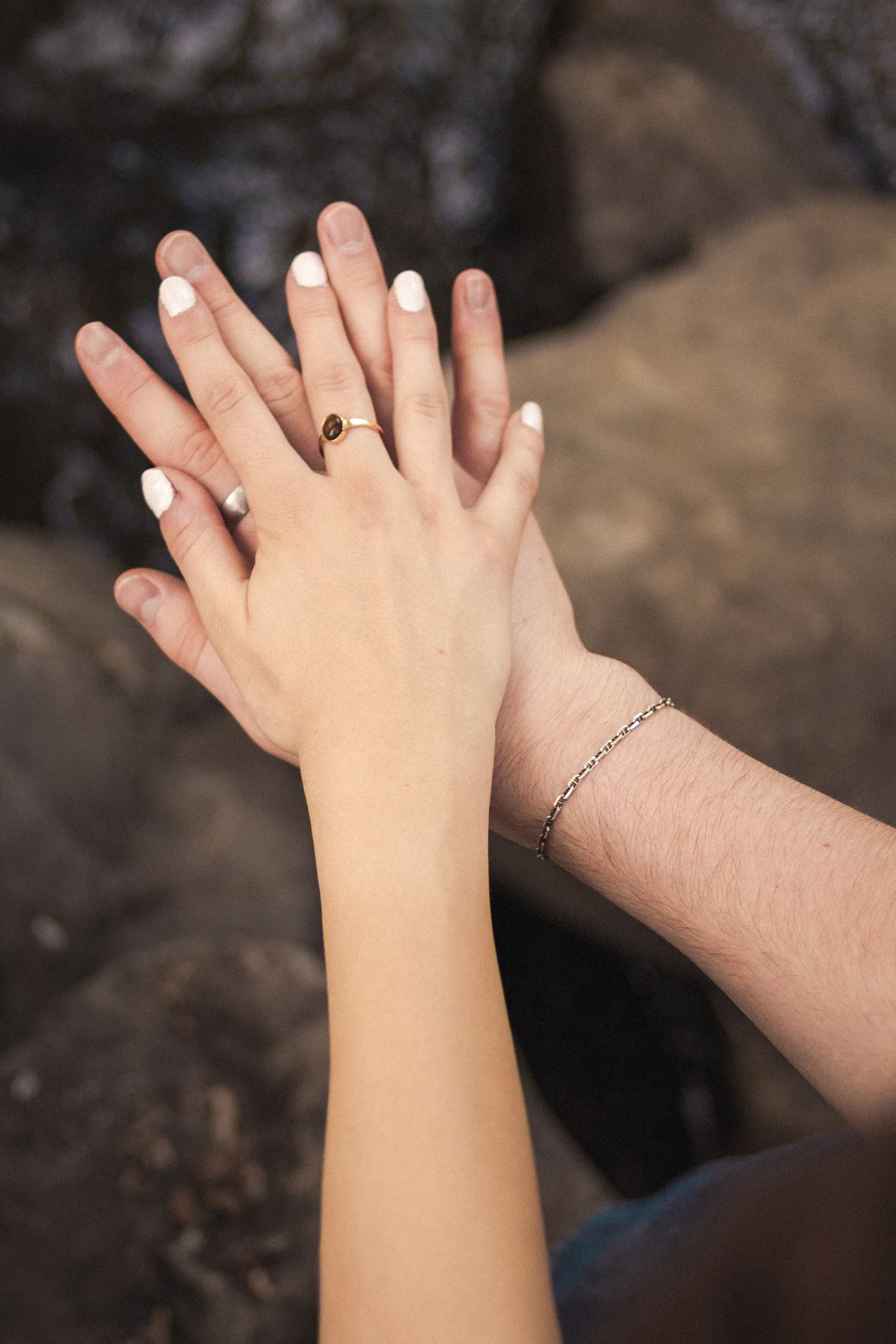 Detail shots of a couple holding hands in Utah County.