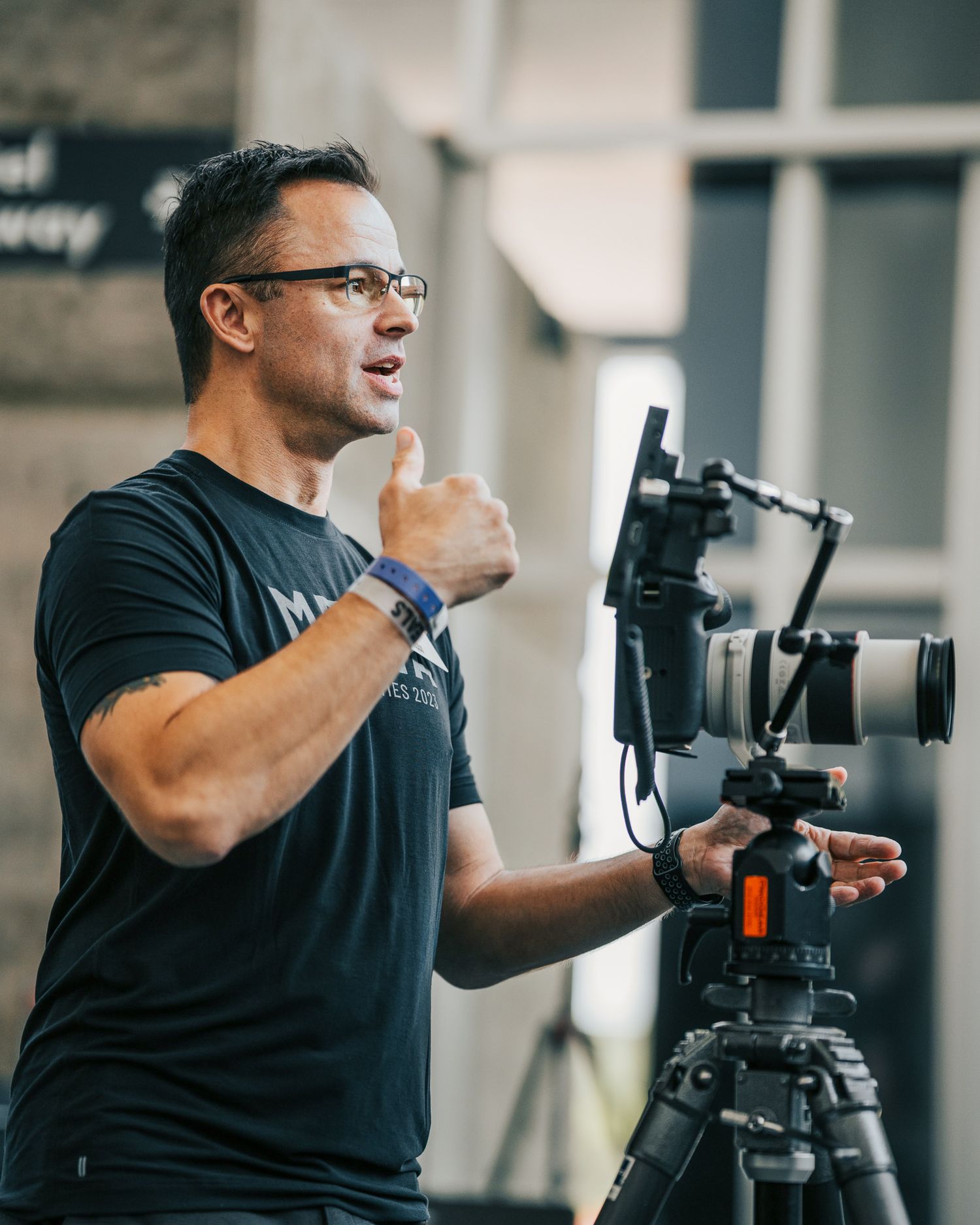 Tai Randall doing athlete headshots at the 2023 CrossFit Games in Madison, WI