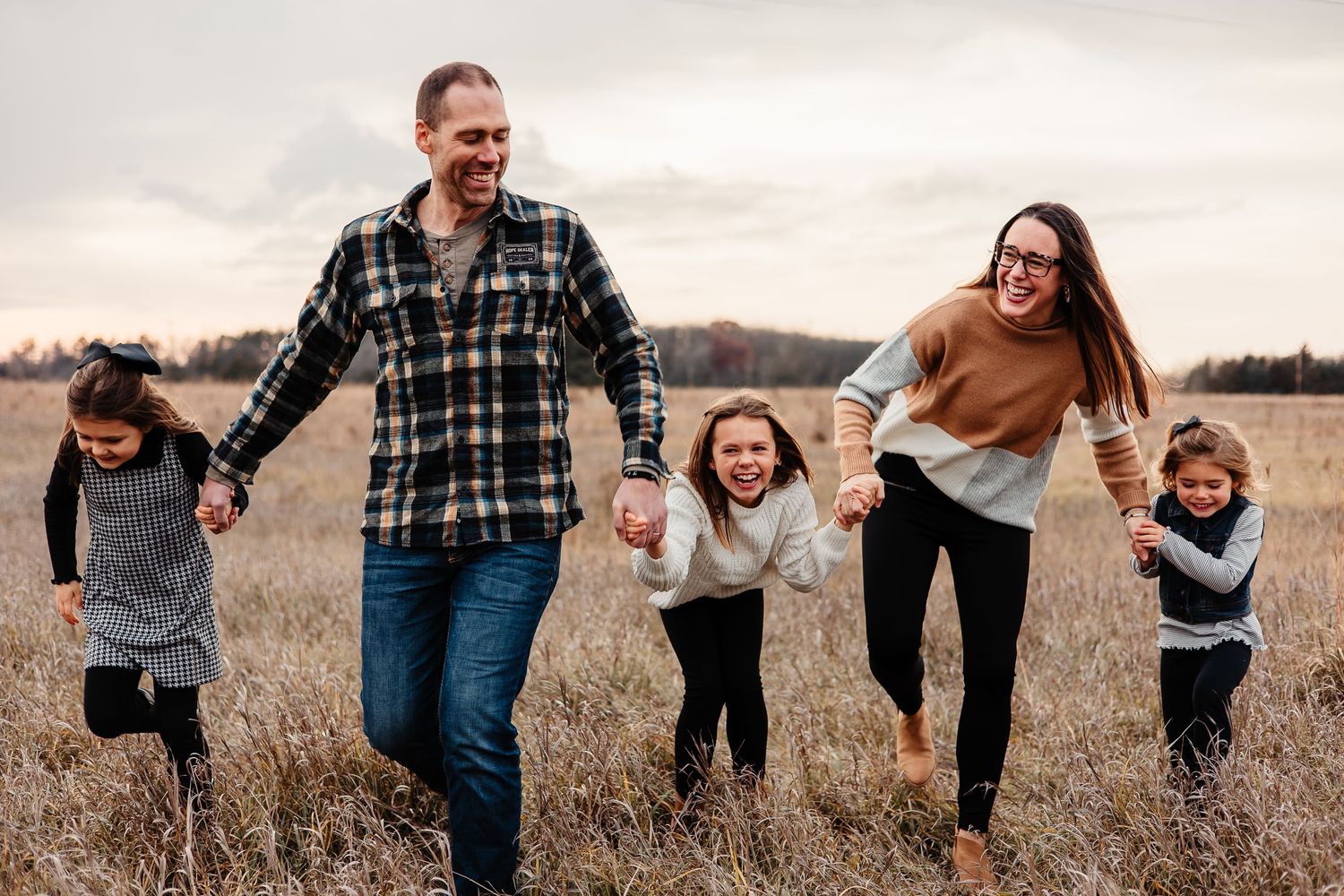 Northern Minnesota family engaging in some fun field photos.