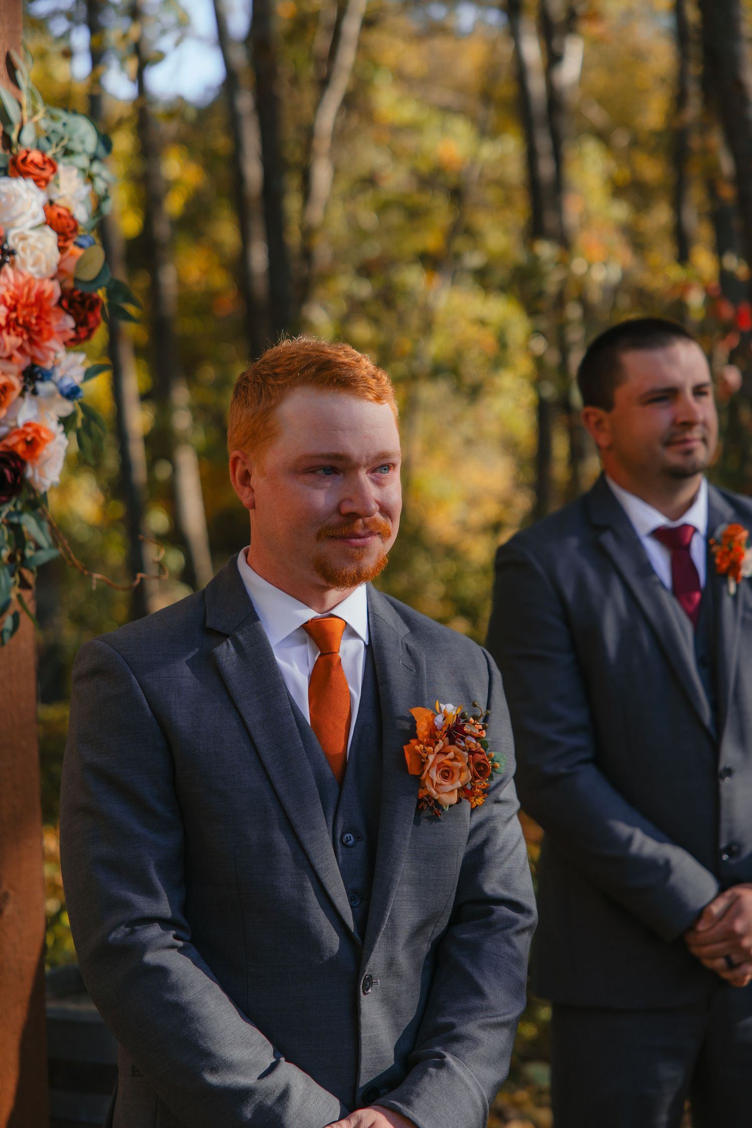 Groom tears up as bride walks down aisle in the outdoor ceremony space at Bluebelle event venue