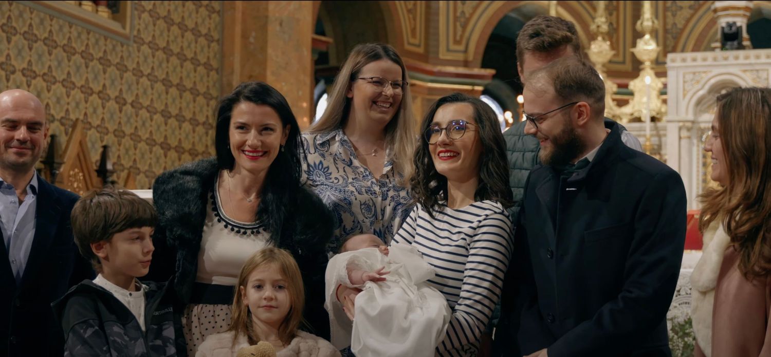 Capture the sacred moment of your baby’s baptism with a beautiful family photo, showcasing the love and faith of the parents and child.