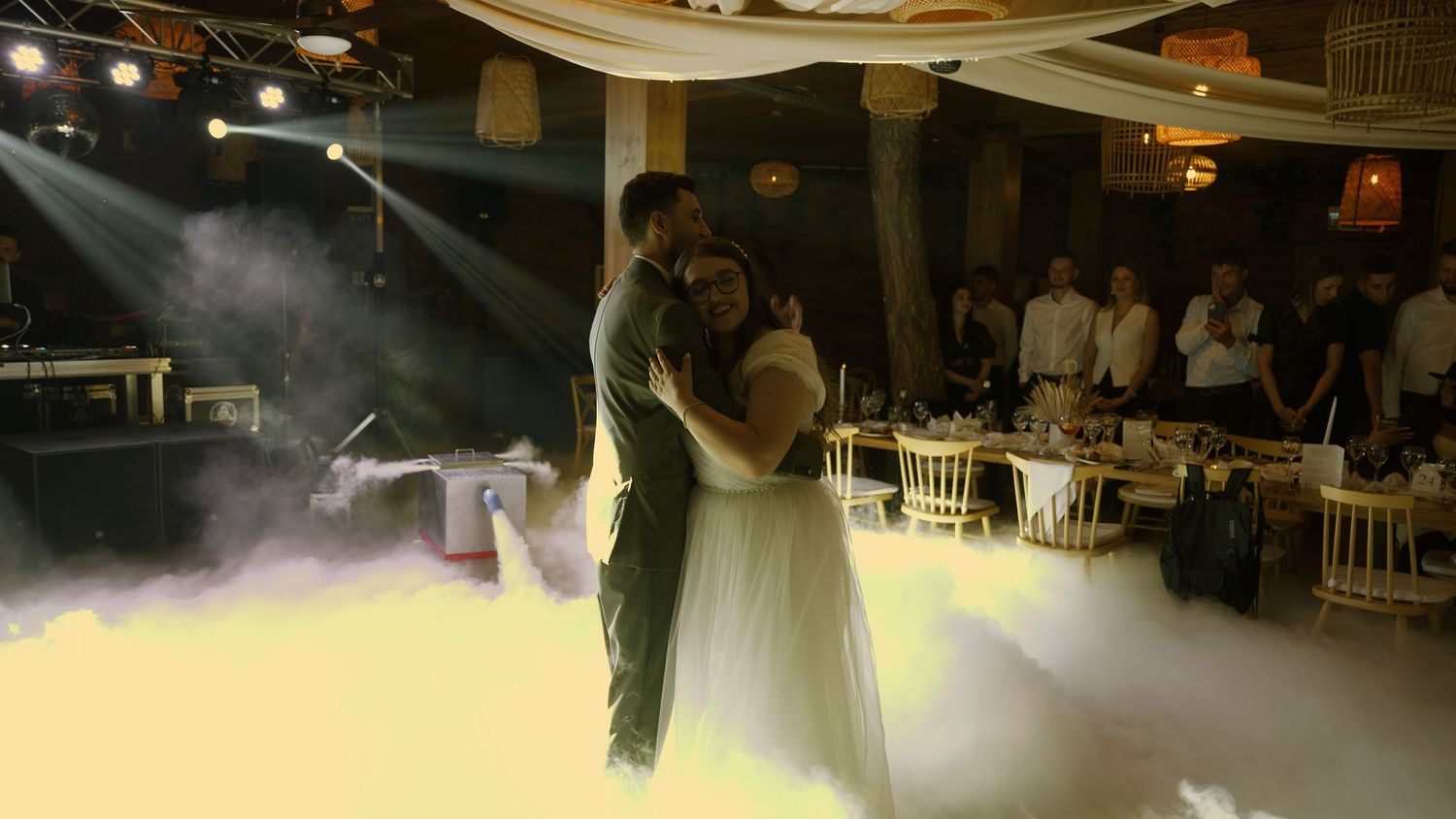 Capture the magic of your wedding day with the bride and groom sharing their first dance, a timeless moment of love.