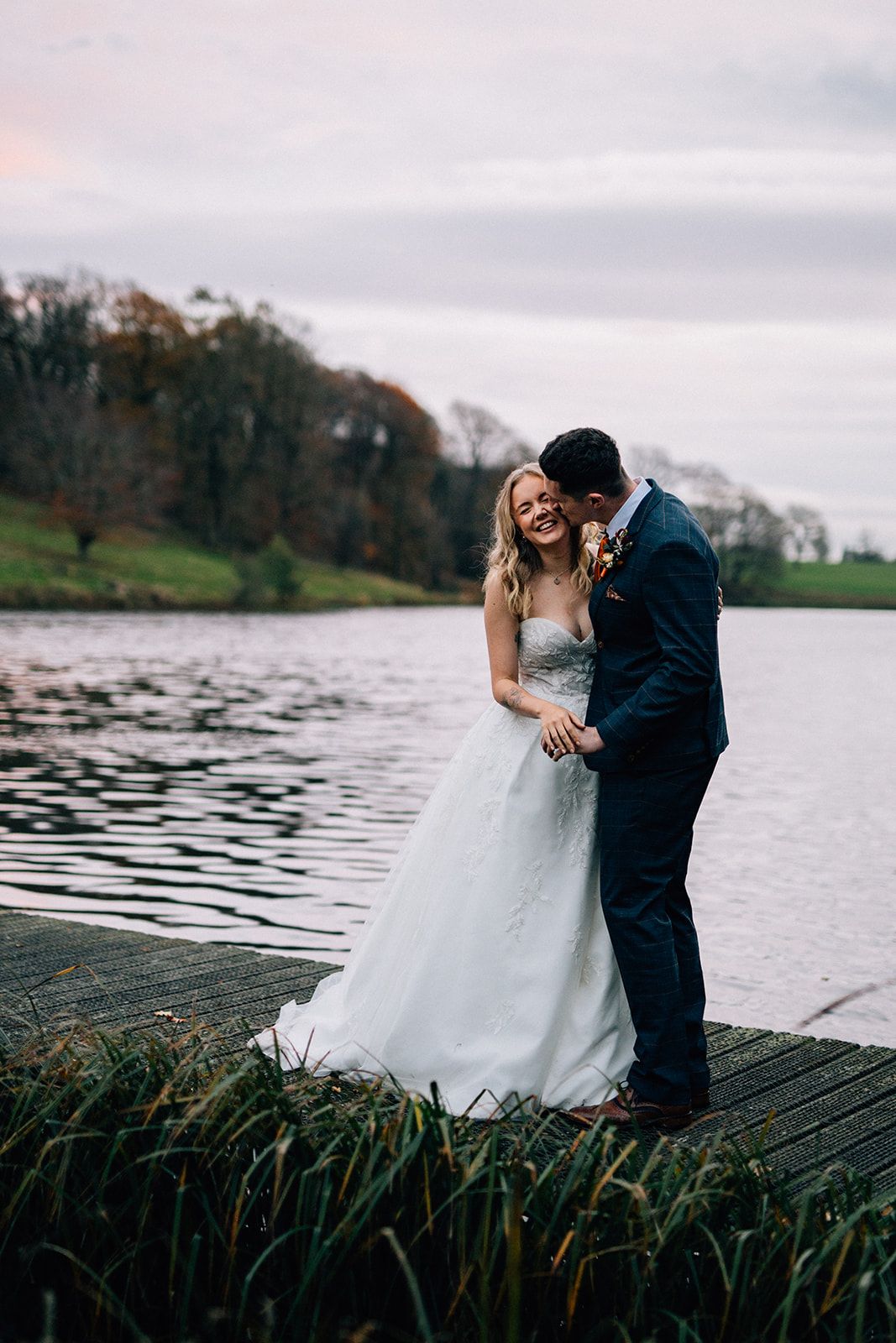 couple by the lake at the Coniston Hotel, near Skipton