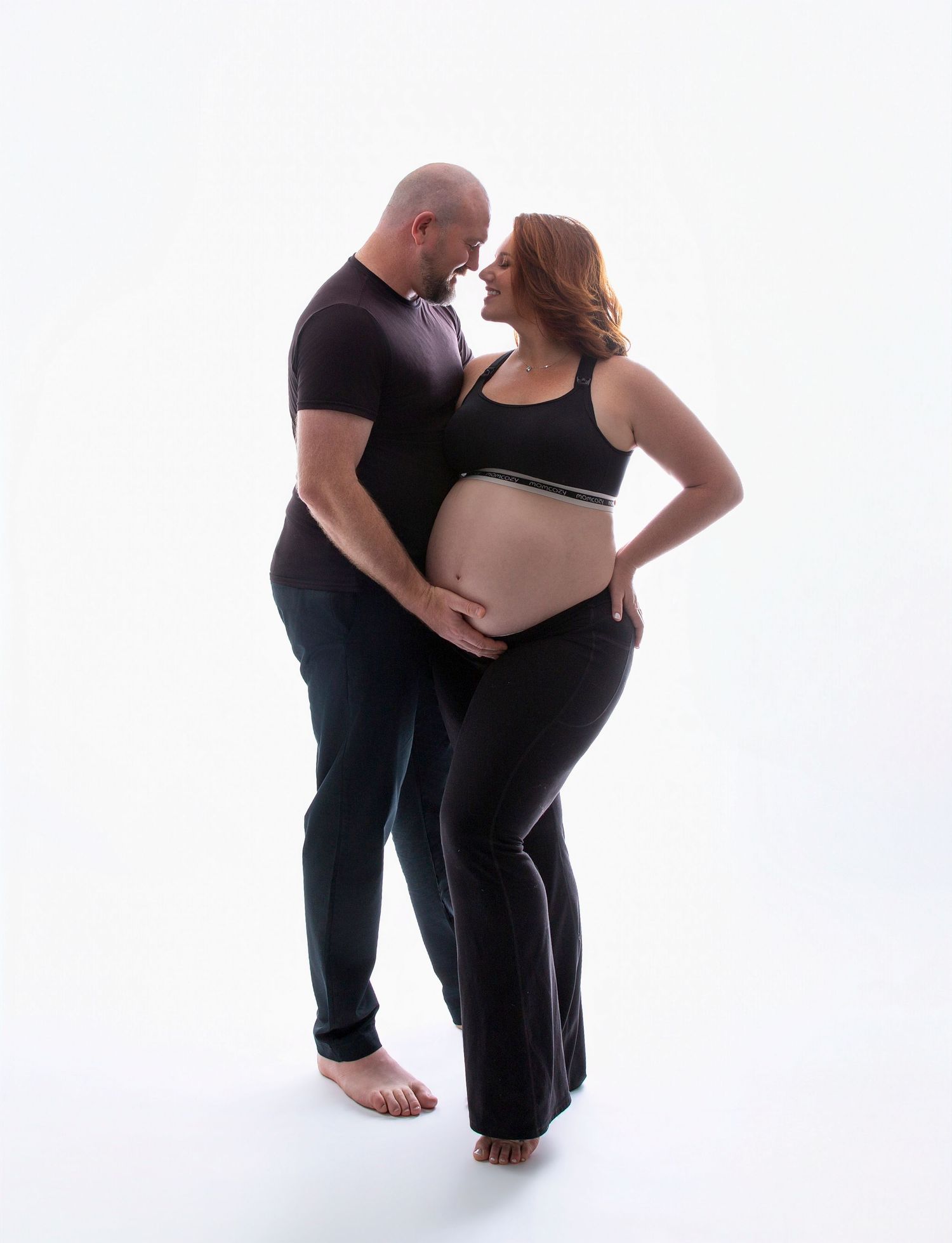 pregnancy photo in the maternity photo studio Bradenton with the husband