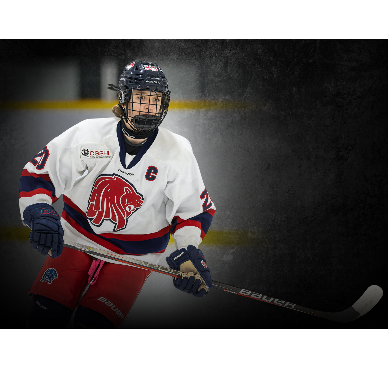 Ice hockey player wearing white team jersey with captain patch holding hockey stick.