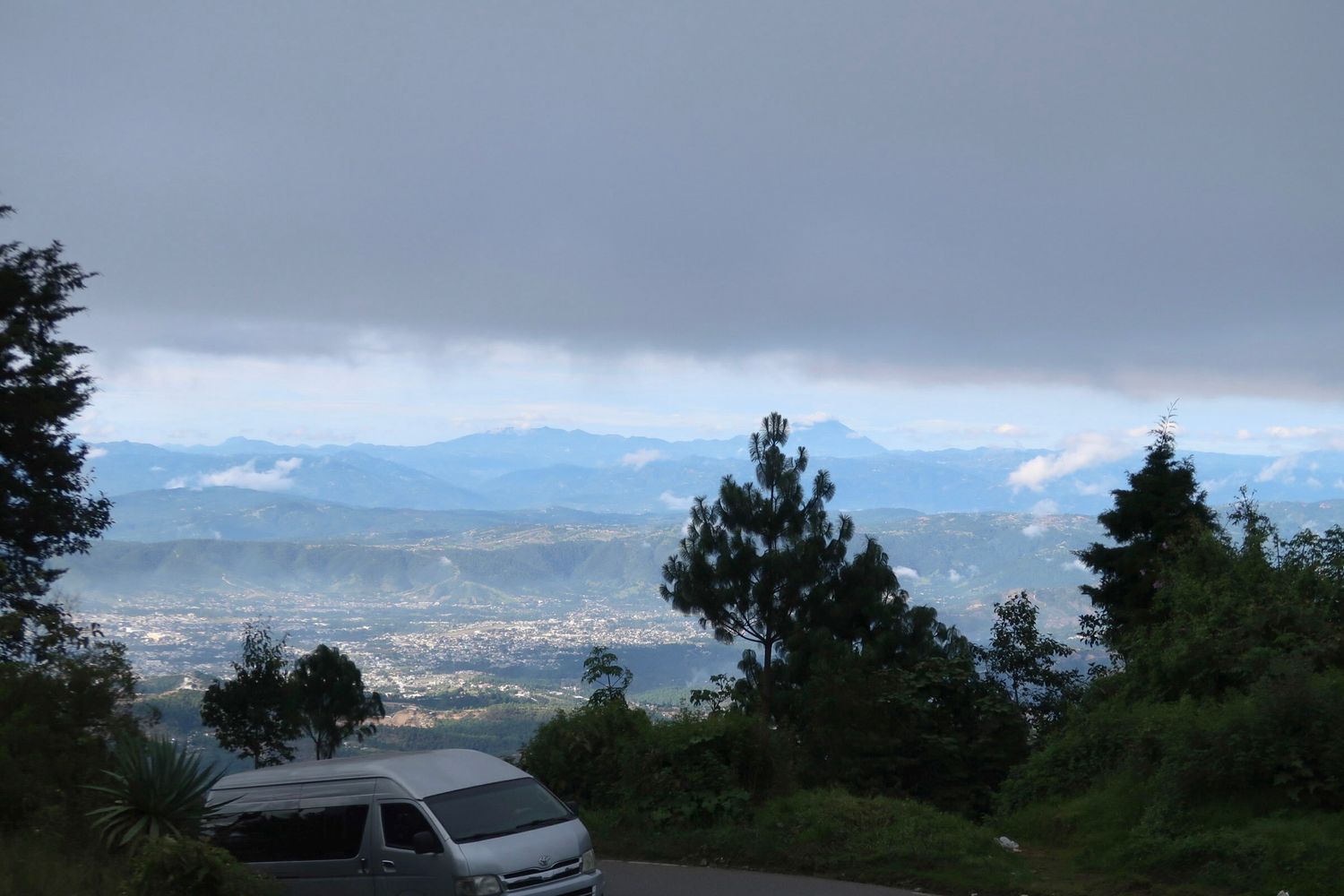 Scenic mountain landscape panorama under cloudy skies, Guatemala, travel photography