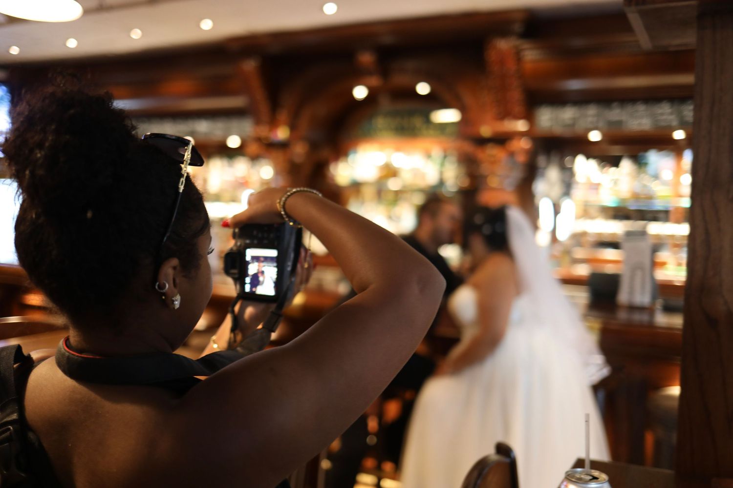 Restaurant interior with warm lighting and blurred background creating cozy atmosphere, event photography, wedding photography, mpls mn