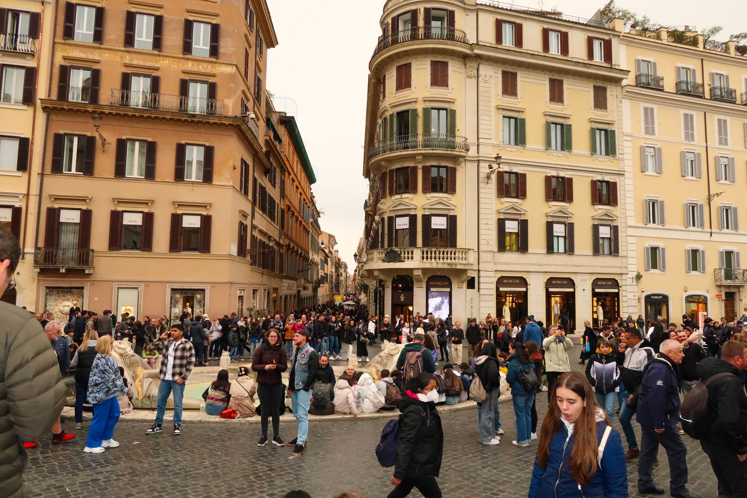 Historic European street with classical architecture and crowded plaza, travel photography, spanish steps, rome italy